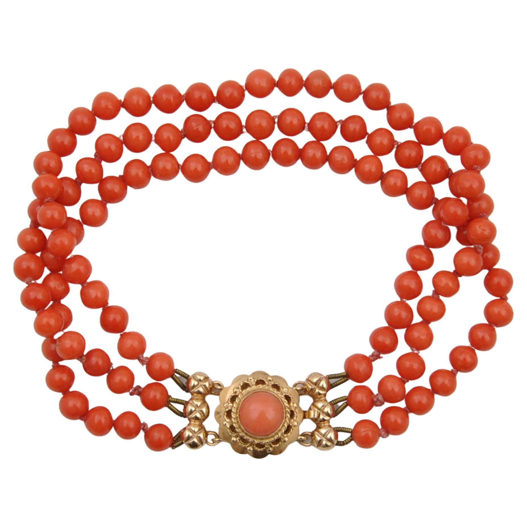 Bracelet perlé ancien en or 14 carats et corail rouge