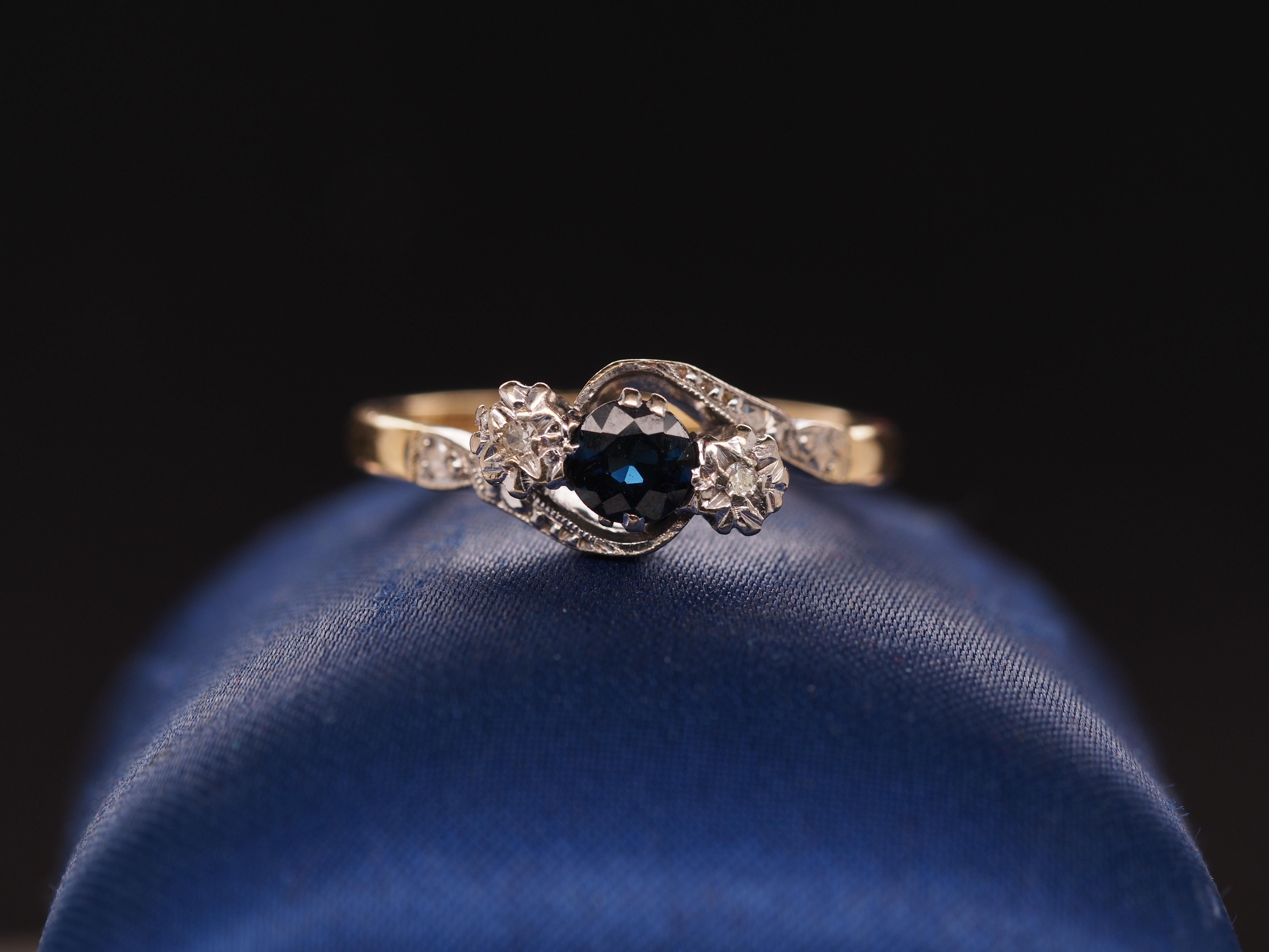 Item Details:
Ring Size: 7.5
Metal Type: 18k Yellow Gold [Hallmarked, and Tested]
Weight: 3.5 grams
Center Stone: Sapphire, Natural, .35ct, Blue
Diamond Details: .10ct, total. G-H Color, VS Clarity
Band Width: 2.0mm
Condition: Excellent
