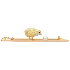 1900s Seed Pearl and Ruby Yellow Gold Chick and Egg Bar Brooch