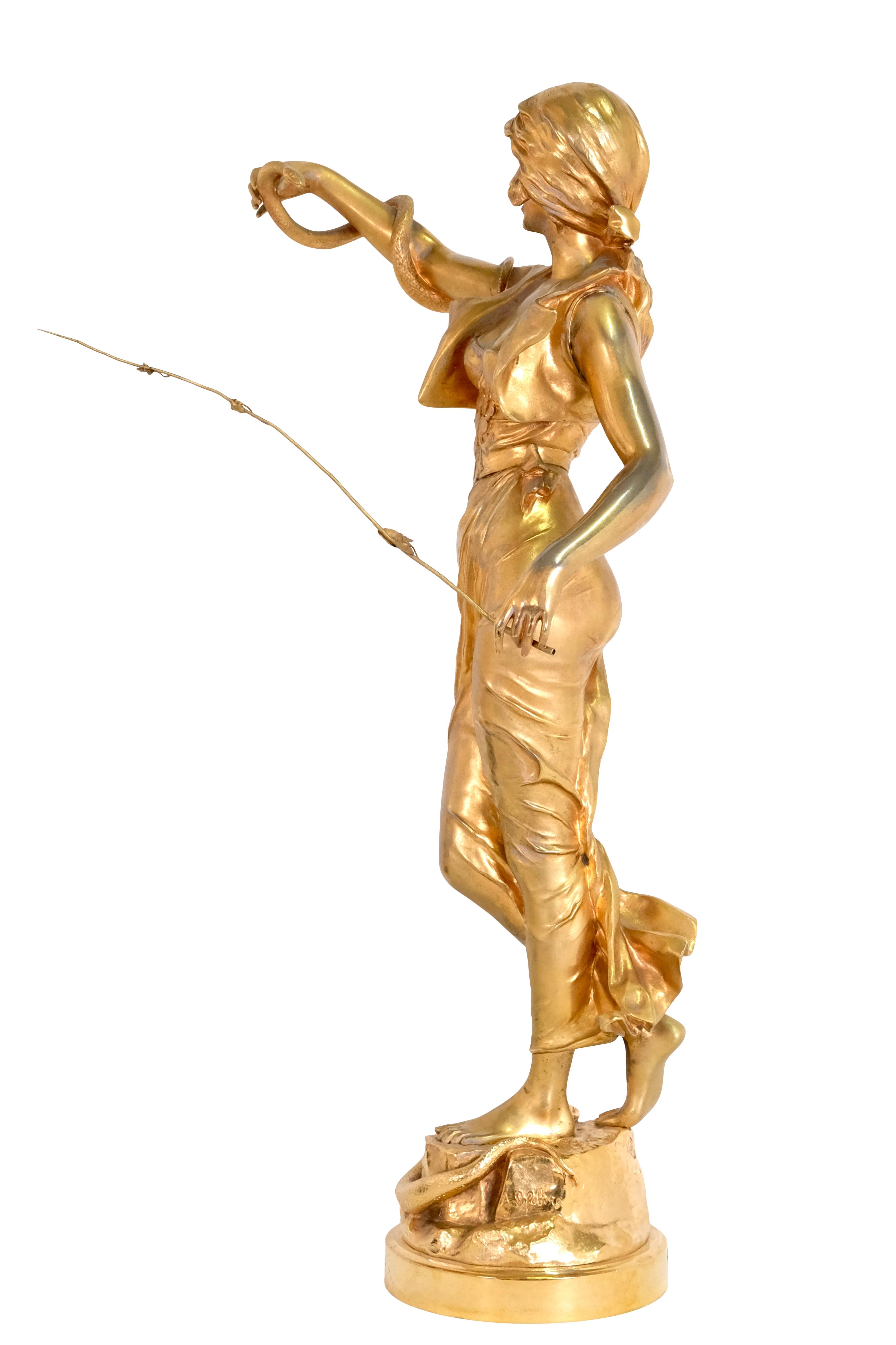Snake charmer 

Fire-gilt bronze 
by A. Lefebvre, signed 
with foundry stamp 

Original art nouveau, France around 1900

Dimensions: 
Height: 75 cm
Diameter, base: 18 cm.