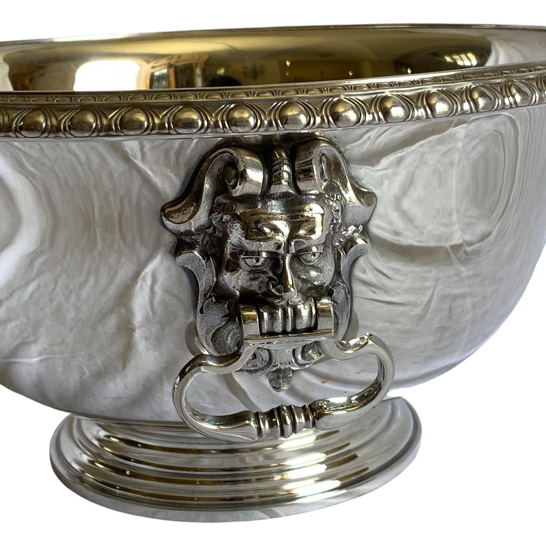 1900s Hallmarked sterling silver handled bowl accompanied with original base. Finley detailed with claw feet. Bowl has handles. Diameter of the bowl is 11.5