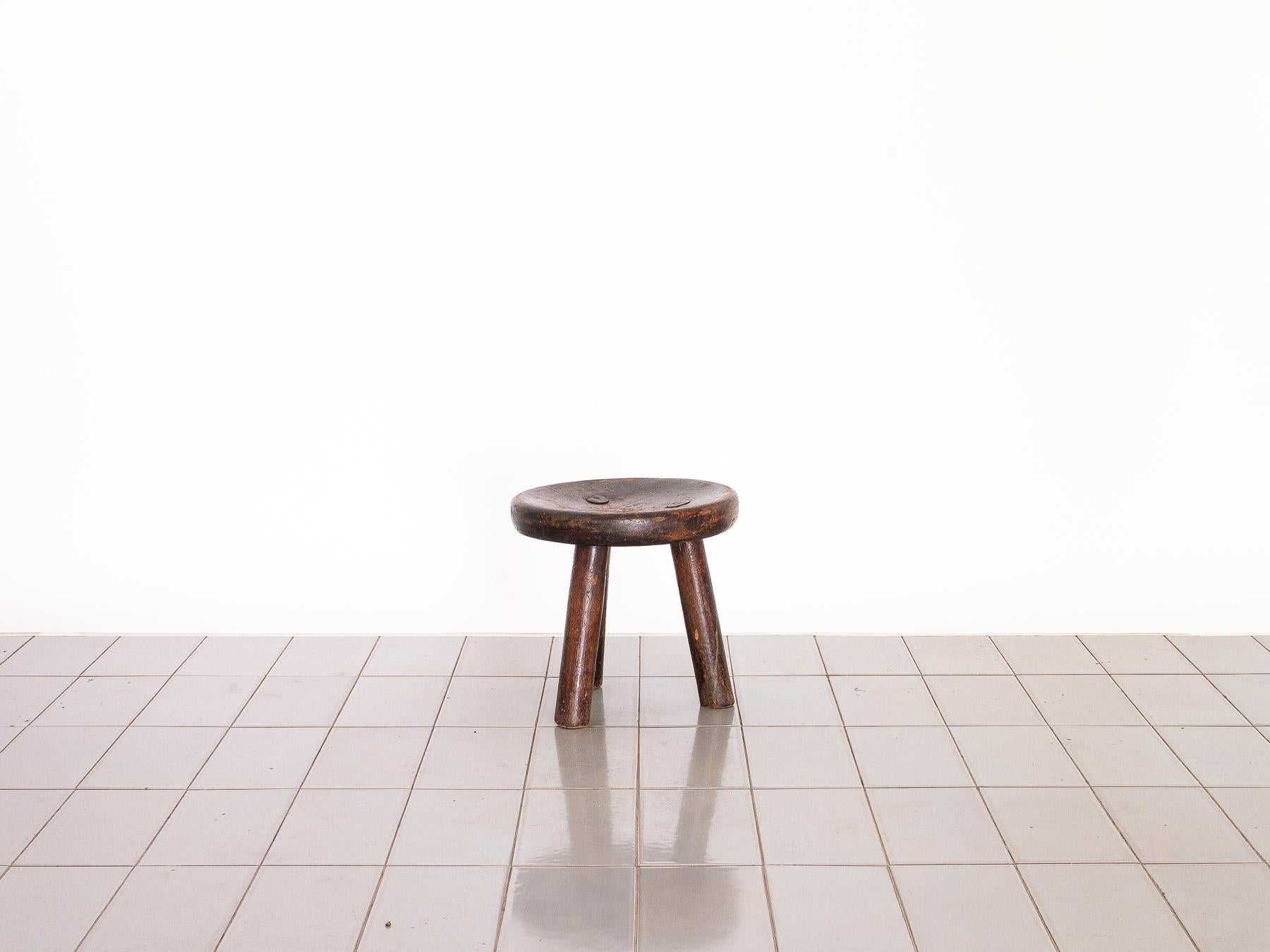 This stool comes from a selection of pieces acquired in a small and distant countryside town. The amazing patina and marks of the passage of time create the unique surface of each of the pieces.