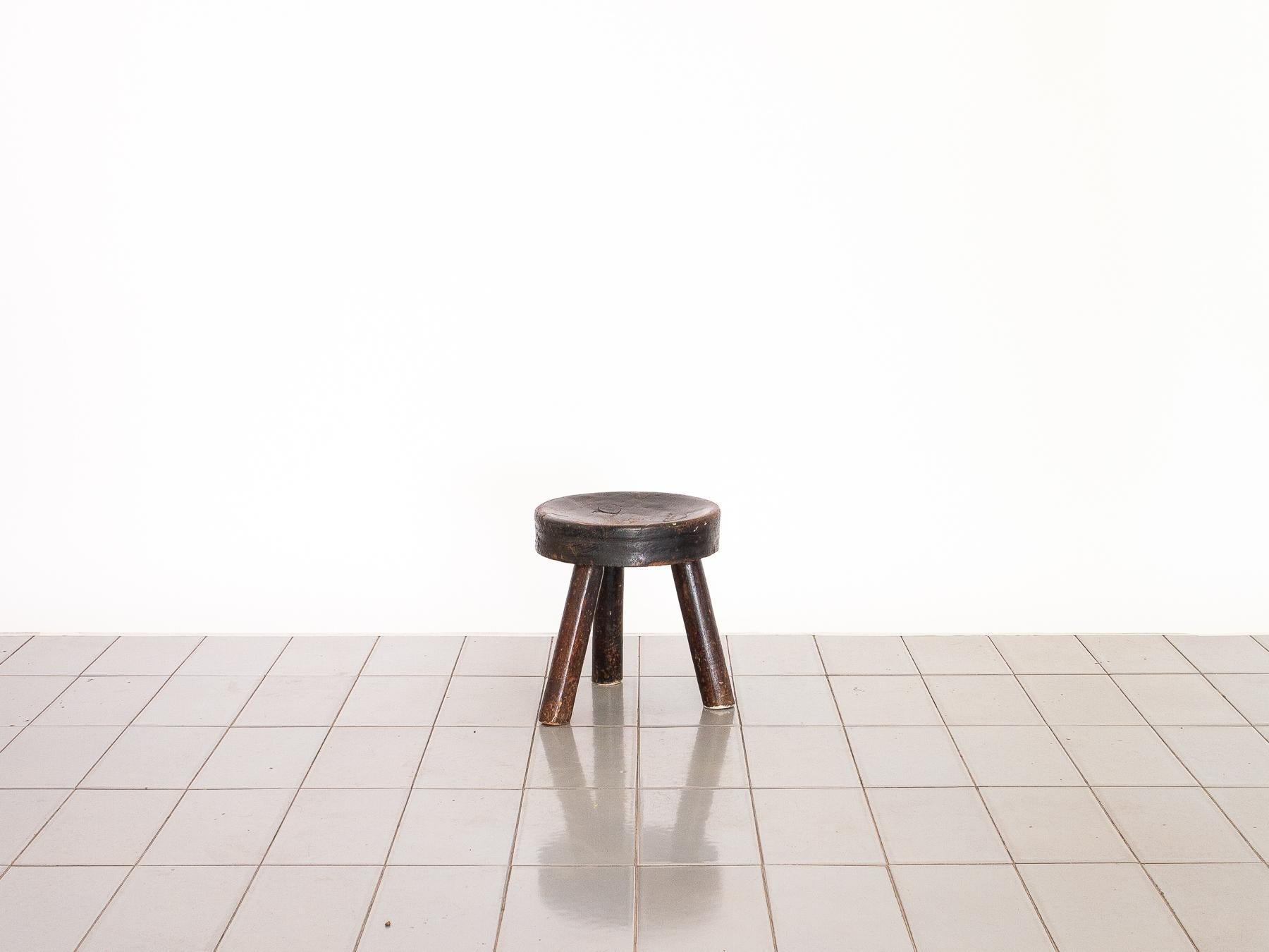 This stool comes from a selection of pieces acquired in a small and distant countryside town. The amazing patina and marks of the passage of time create the unique surface of each of the pieces.