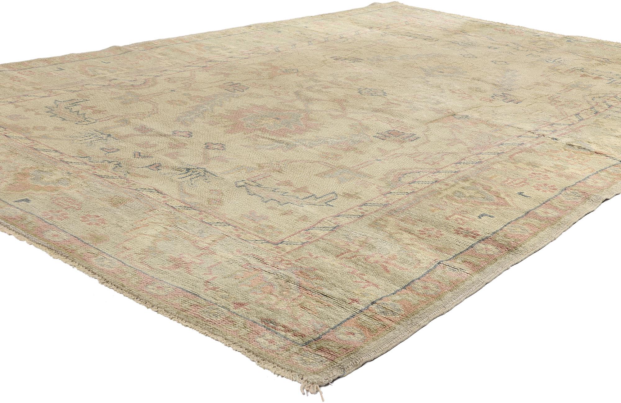 72193 Antique Pastel Turkish Oushak Rug, 06'07 x 09'08. Ethereal and gracefully timeworn, this hand-knotted wool antique Turkish Oushak rug emerges as a faded manuscript of Anatolian artistry—its threads whispering tales of bygone eras. Woven in the