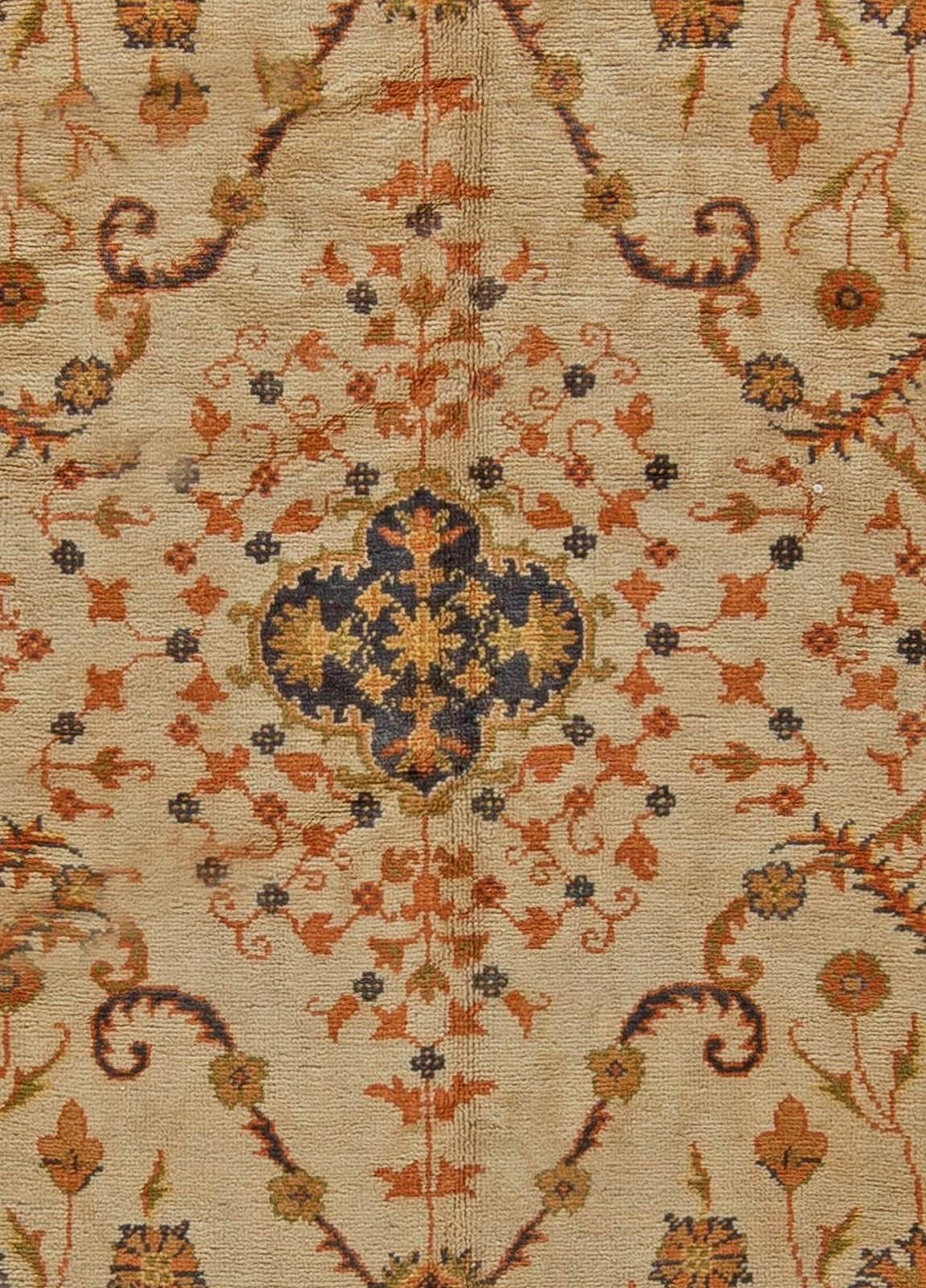 1900s Turkish Oushak camel and orange with floral motifs handwoven wool rug
Size: 10'0