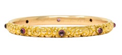 1900s Victorian Garnet Cabochon 14 Karat Gold Floral Foliate Bangle Bracelet