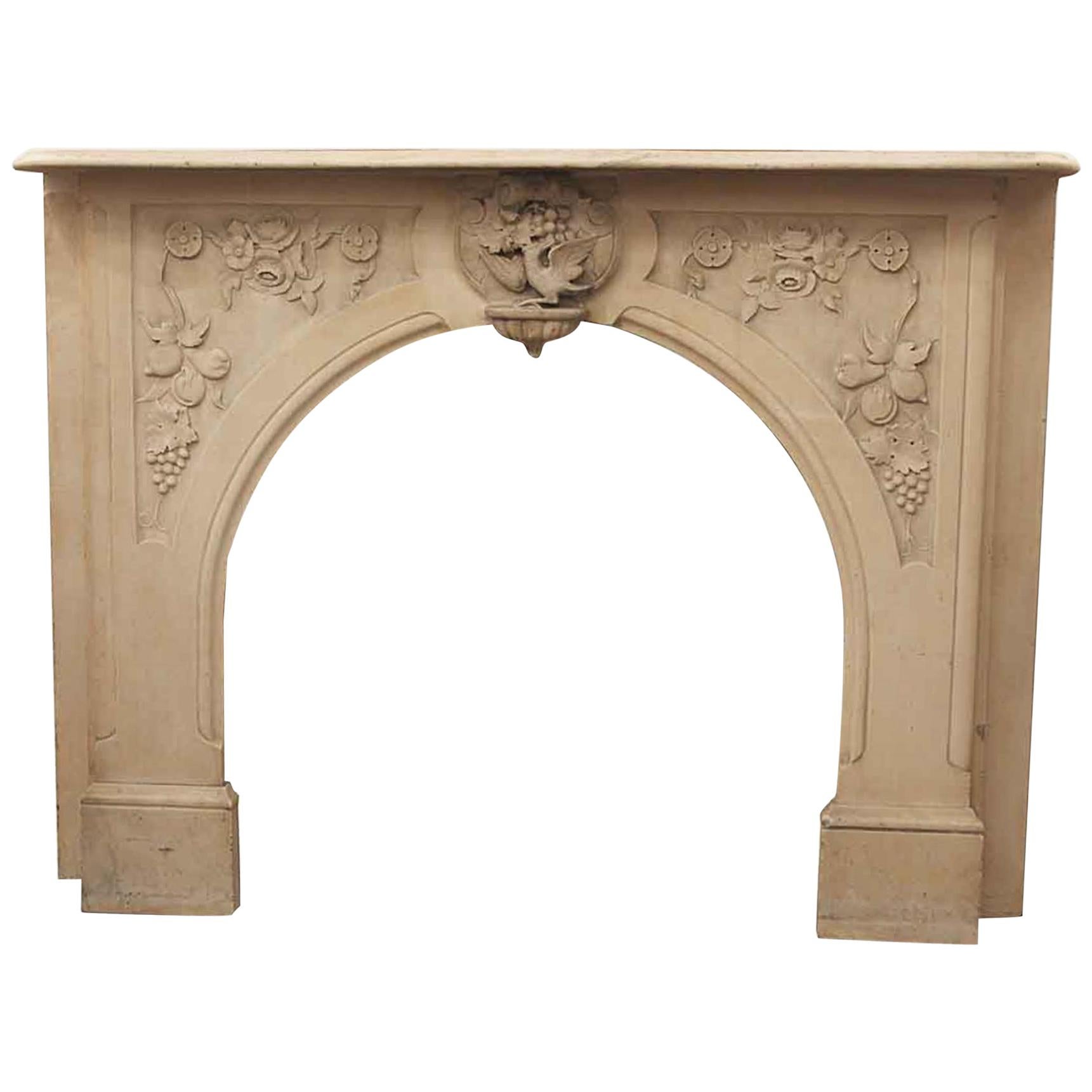 1900s Victorian Hand Carved Tan Arched Marble Mantel with Bird and Floral Motif