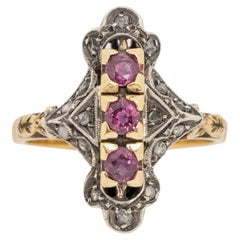 1900's Victorian Two Tone 18K Antique Three Stone Ruby Shield Ring