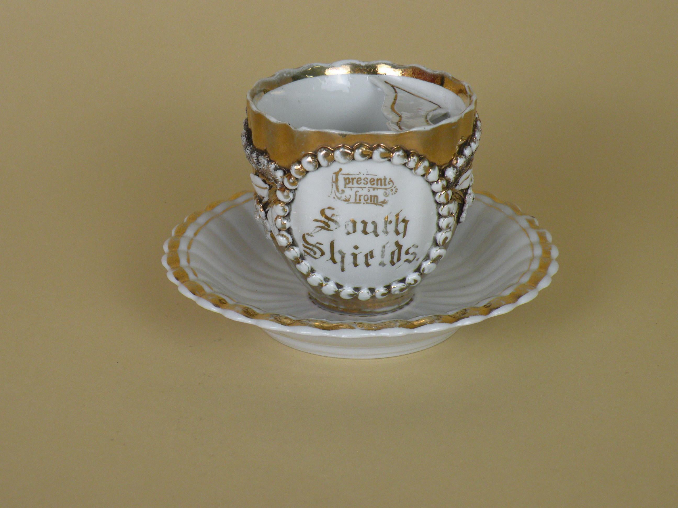 victorian tea cup with mustache guard