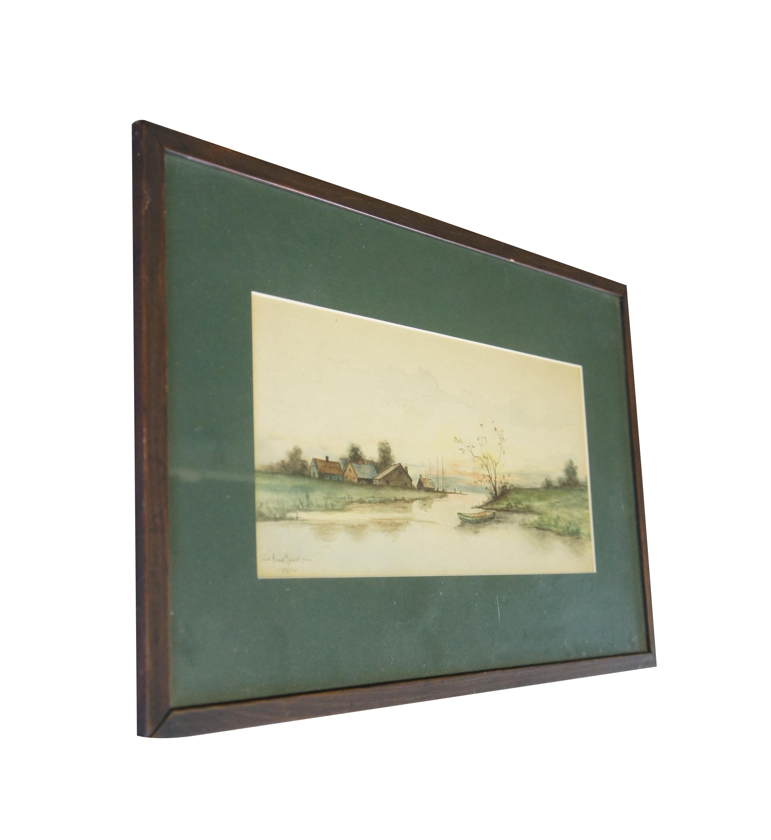 An early 20th century watercolor painting on paper, circa 1901. Signed Anna Mason along the lower left. Features a countryside with farmhouses next to a body of water. In the foreground a boat can be seen poised by a tree. The watercolor is framed