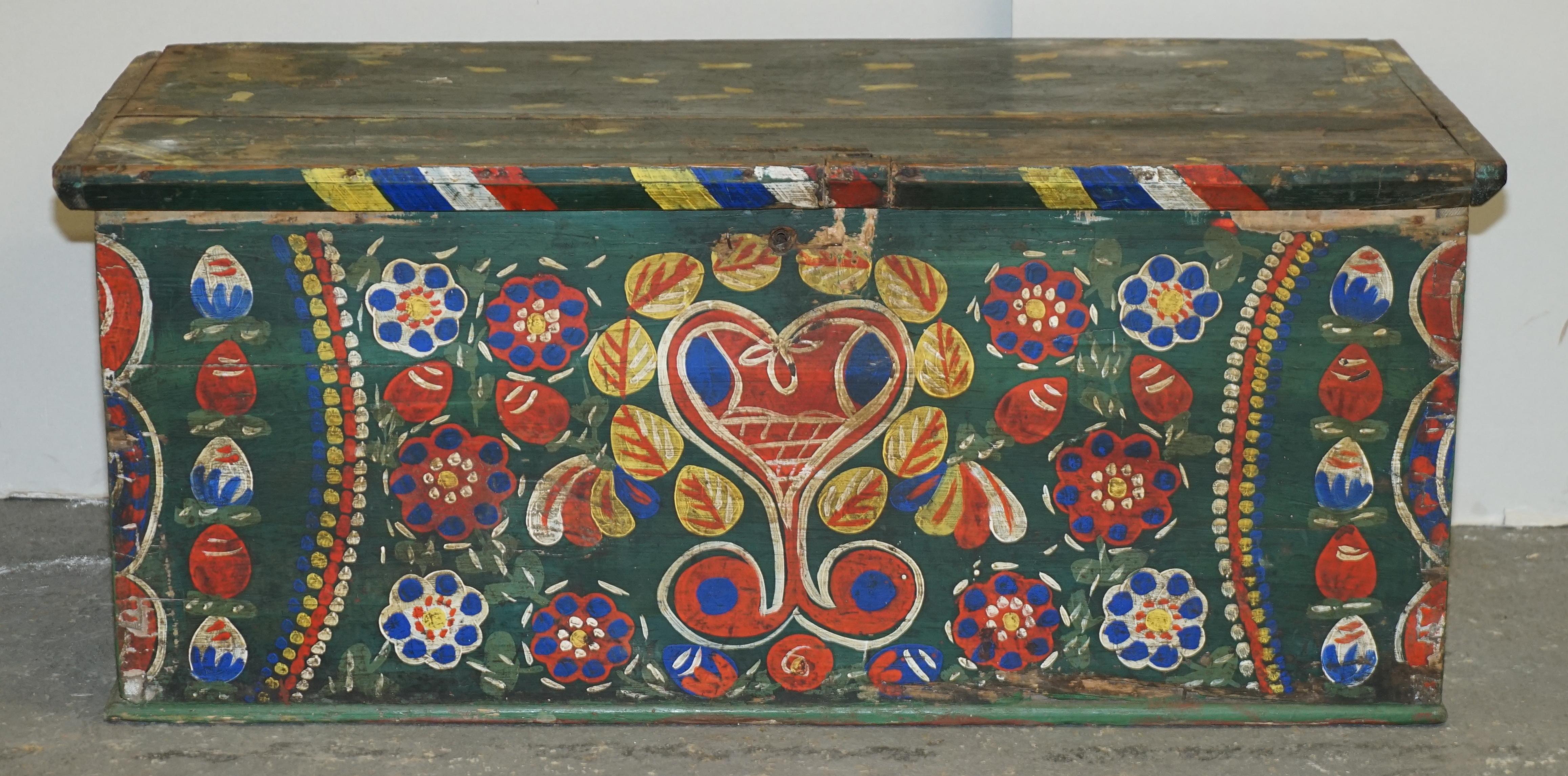 We are delighted to offer for sale this stunning, circa 1901 dated hand painted Romanian clothes trunk or marriage coffer chest depicting a large love heart with flowers

I have recently purchased a very large collection of these original, antique