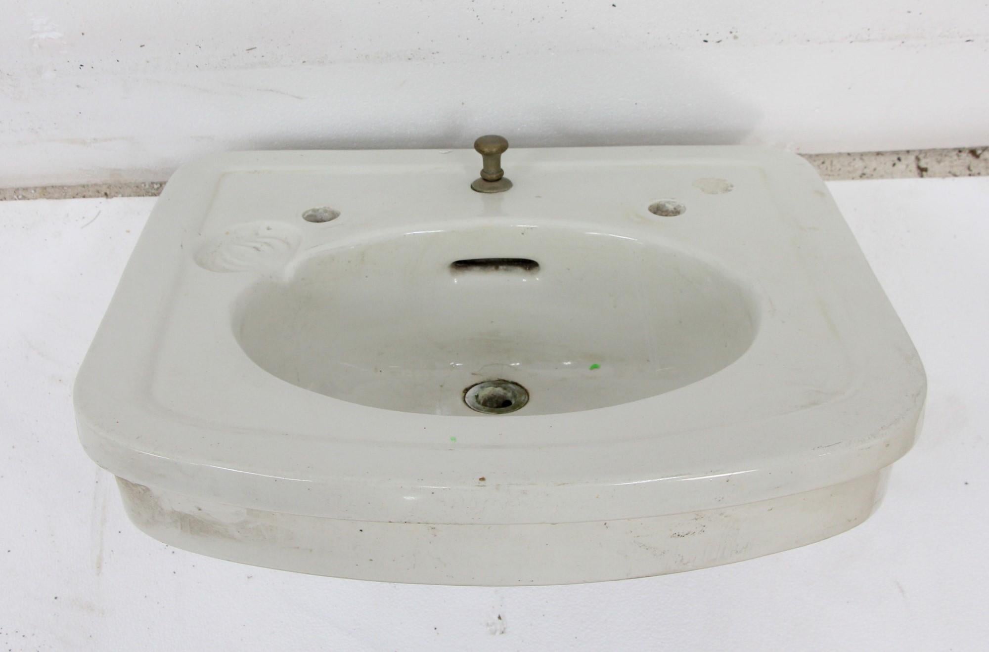 Antique white porcelain wall mount sink with built in soap dish and a curved front edge . Made by The Trenton Potteries Company. Pat. Nov. 4, 1902. This can be seen at our 400 Gilligan St location in Scranton, PA.