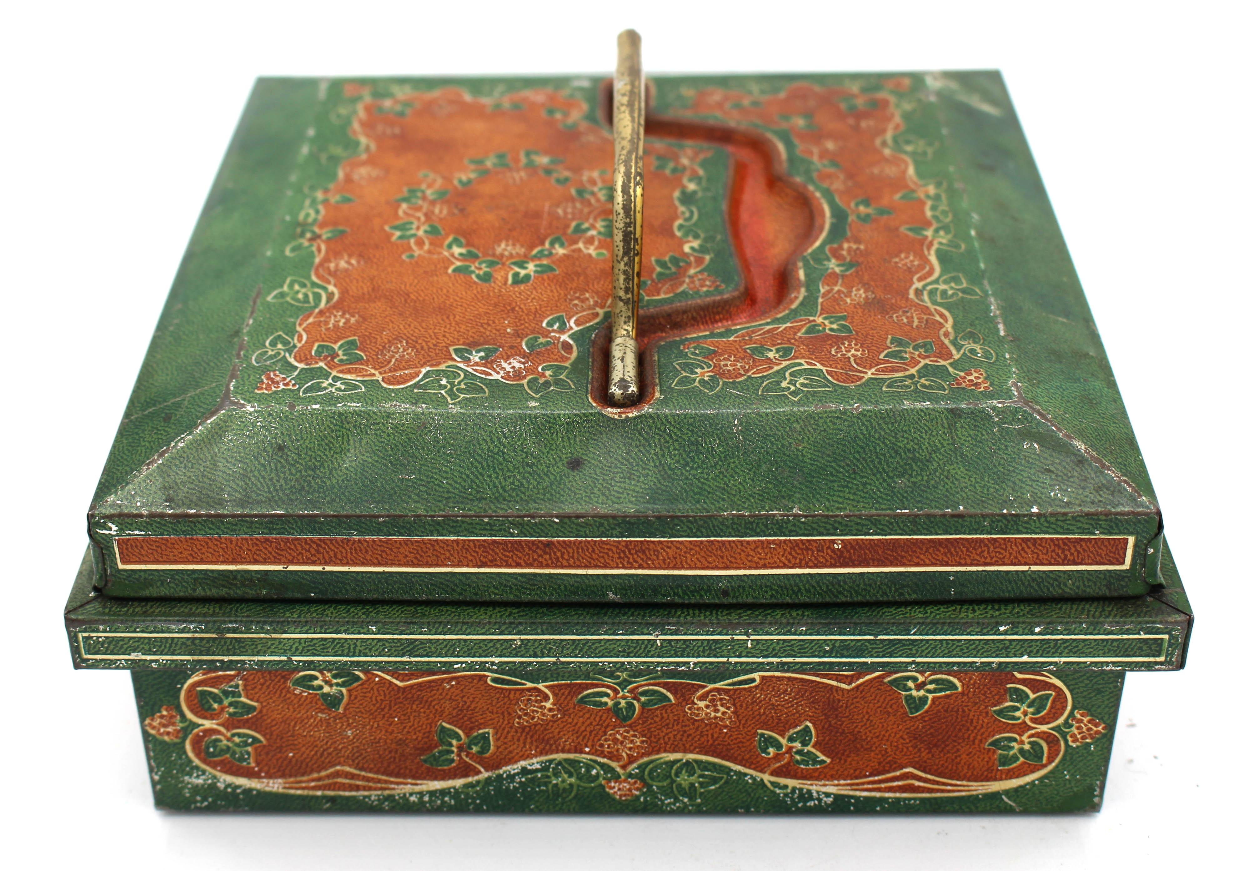 1903 Huntley & Palmers jewelry casket form biscuit tin box. Stylized as a Viennese leather work jewelry box. Recessed handle & fine latch.  Light wear on ridges.
6.5