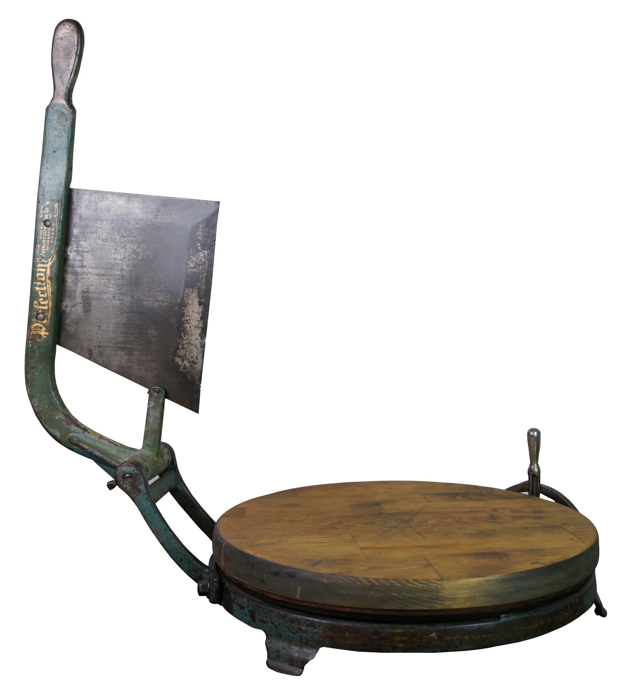 Antique 1904 industrial Perfection cheese wheel or meat cutter by American Computing Co.

The Computing Scale Company a precursor to IBM was founded in 1891 by Edward Canby and Orange O. Ozias in Dayton, Ohio. Its industry was computing scales and