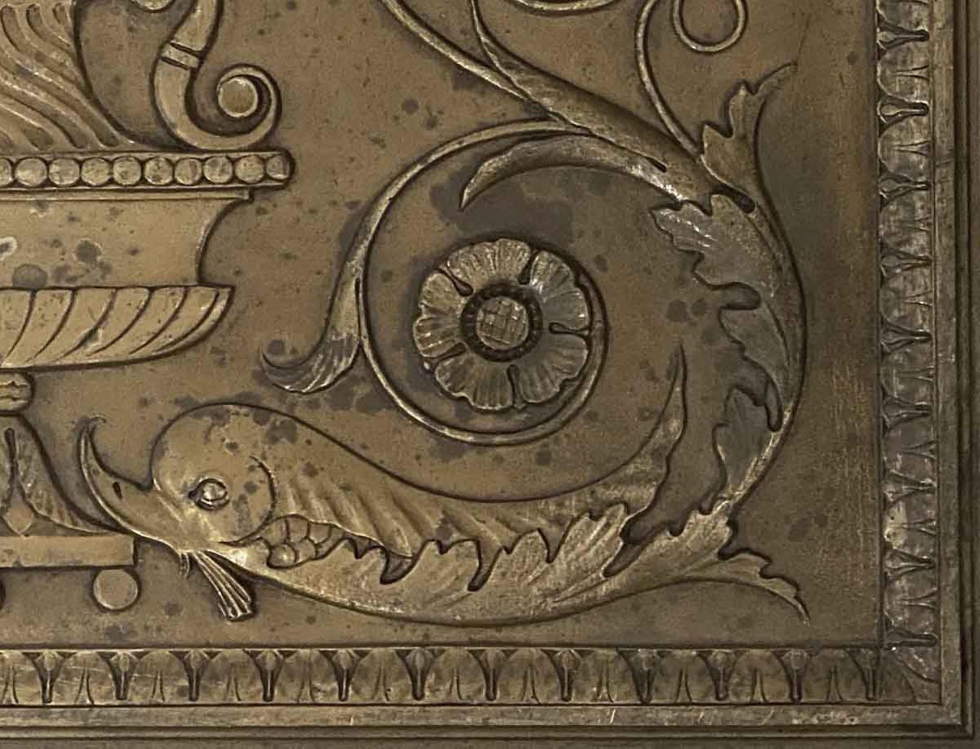 These Beaux-Arts bronze panels feature dolphins, flowers, foliage, birds and a large urn overflowing with fruit. From the 1904 St. Regis Hotel in NYC and were removed during renovations in the 1990s. With original patina. Priced each. This can be
