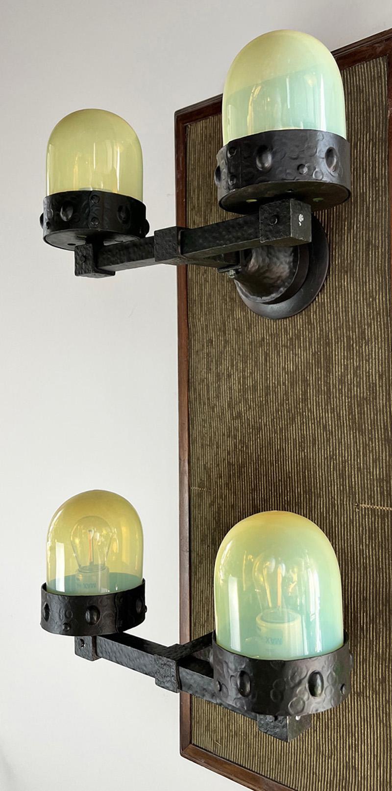 Very unusual pair of early 1900s Arts and Crafts wall sconces. These are larger in scale as they are 14