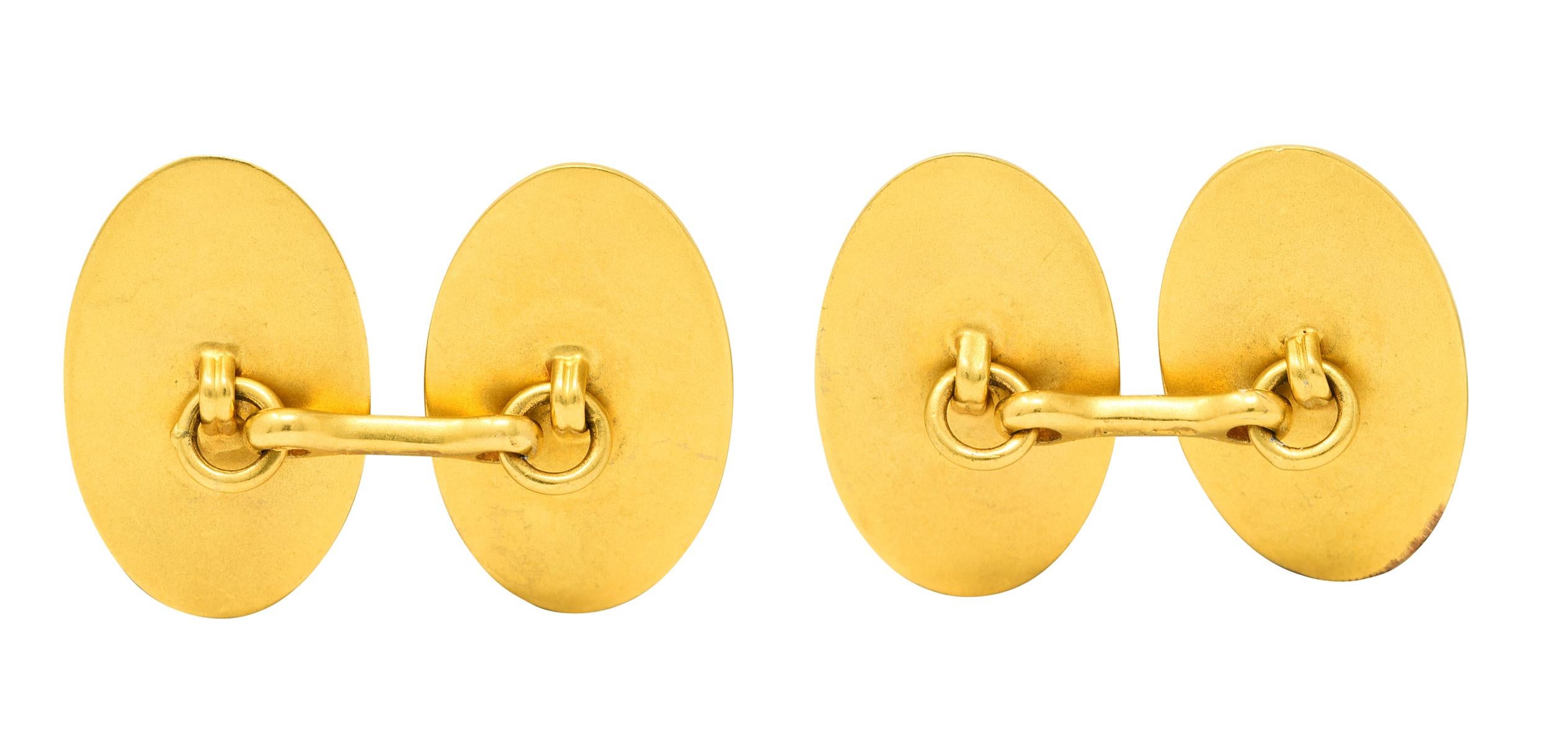 Link style cufflinks terminate as matte gold ovals

Depicting a serene scene of stylized waves under a full moon motif

Stamped 14K for 14 karat gold

Maker's mark for Bippart & Co.

Circa: 1905

Length: 3/4 inch

Oval measures: 1/2 x 13/16