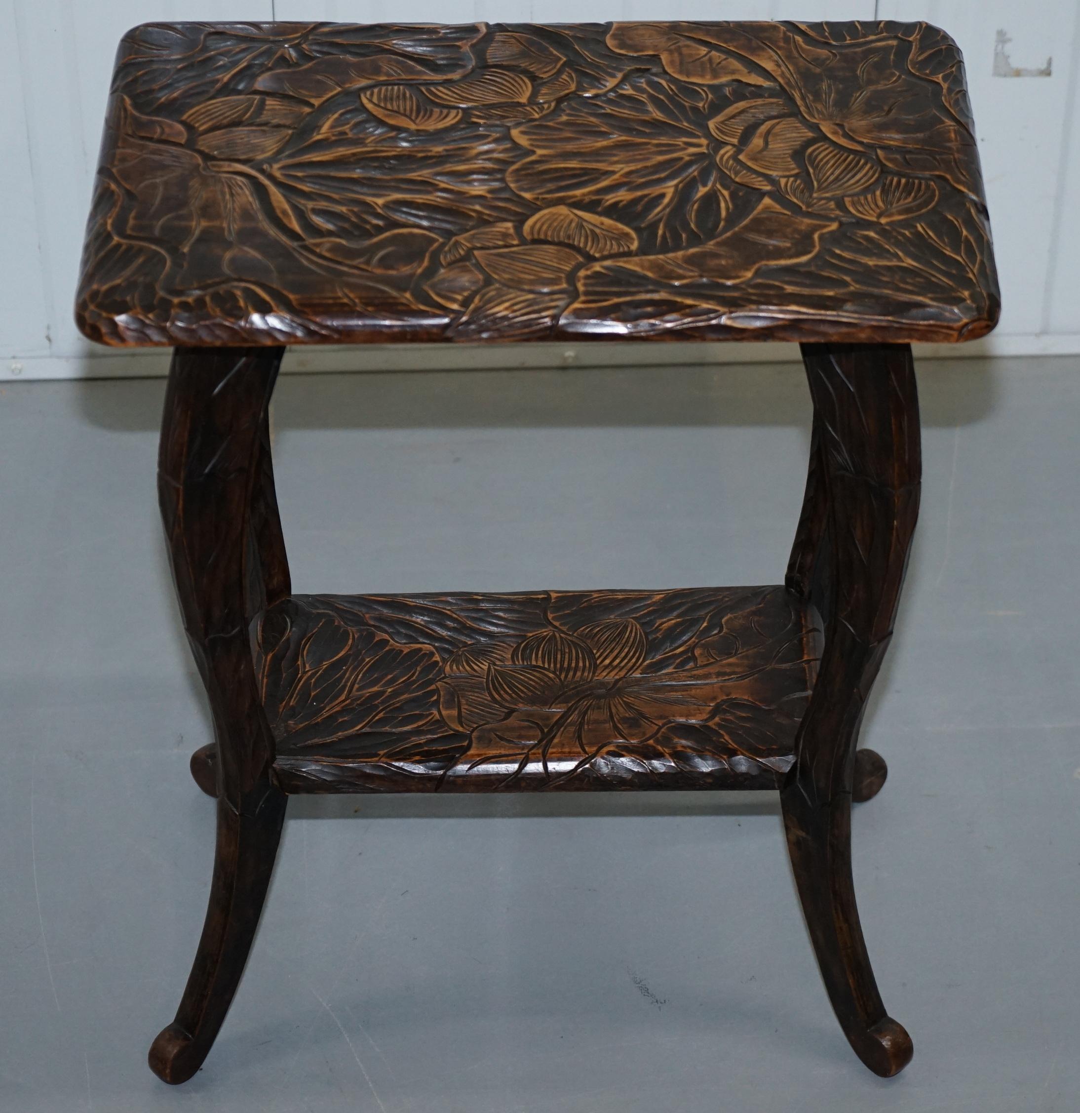 We are delighted to offer for sale this lovely Liberty & Co hand carved wood depicting floral foliage circa 1905

These tables were hand carved in Japan for Liberty & Co during the early 1900’s, they were commissioned by Liberty as part of their