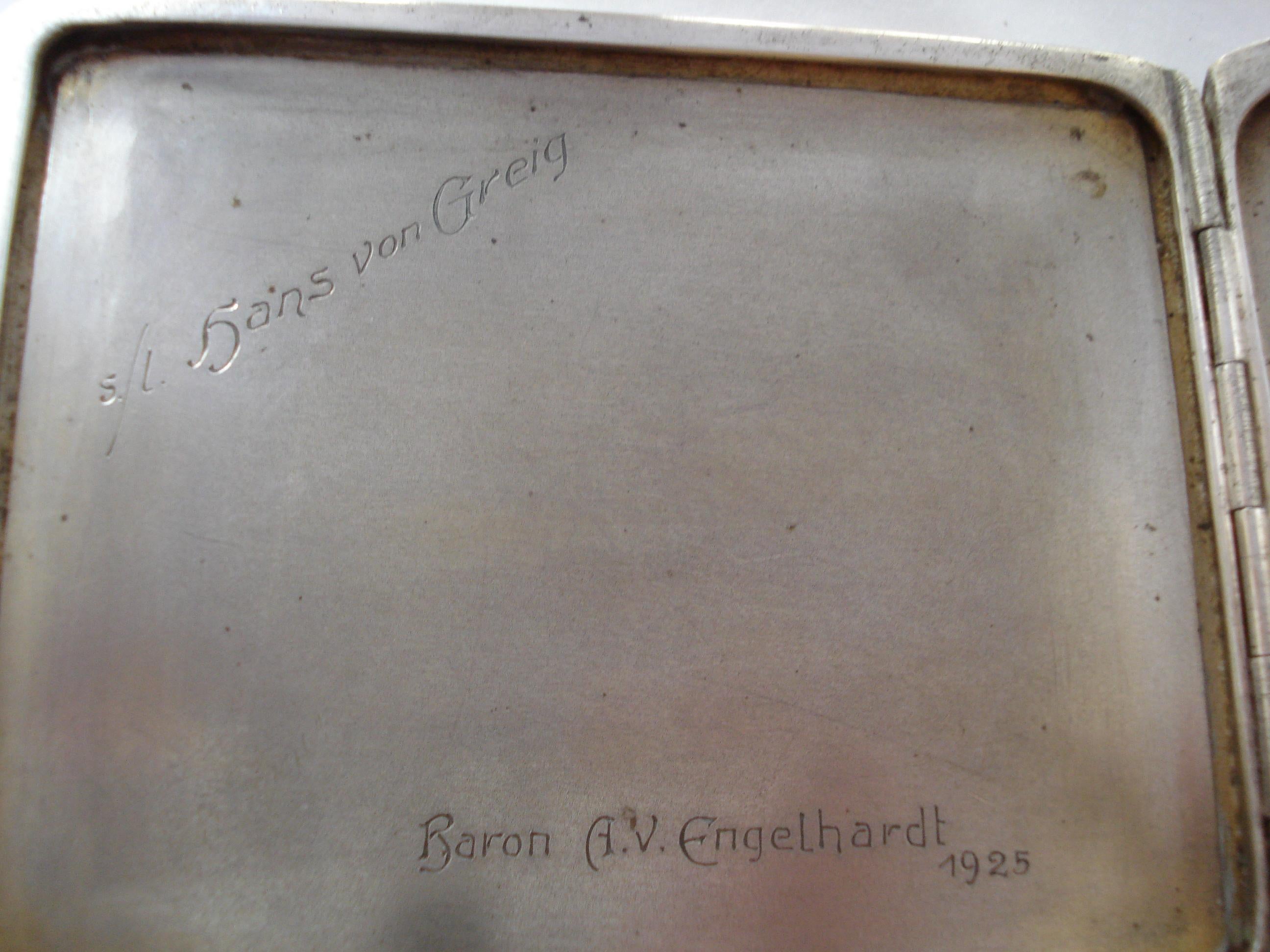 Silver cigarette case, 1905. Hinged lid with enameled image of 