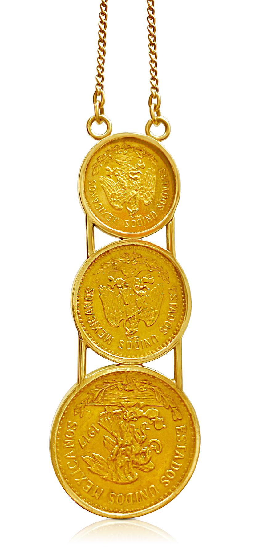 This magnificent Gold Pendant is a treasure of Mexican history and culture: Centering three 22K Pure Gold Mexican Peso Coins and set in 14K Yellow Gold.
Coins:
1) 1906 