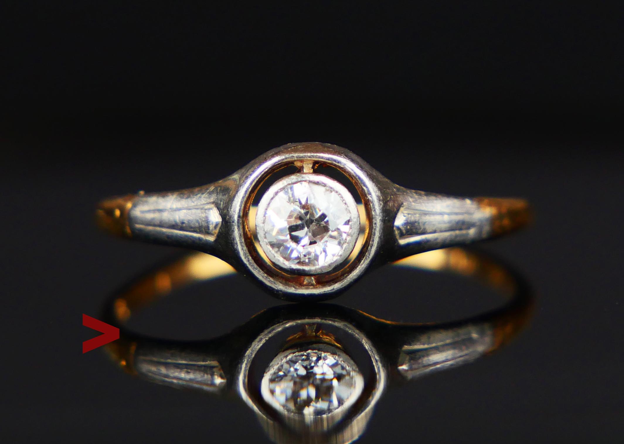 A ring with band in solid 18K Yellow Gold with shoulders and cross-haired bezel in Platinum featuring natural old European diamond cut Diamond Ø 4.15 mm x 2.2 mm deep / ca 0.35 ct , color ca. G,H / SI . The stone's back is open.

Worn Swedish