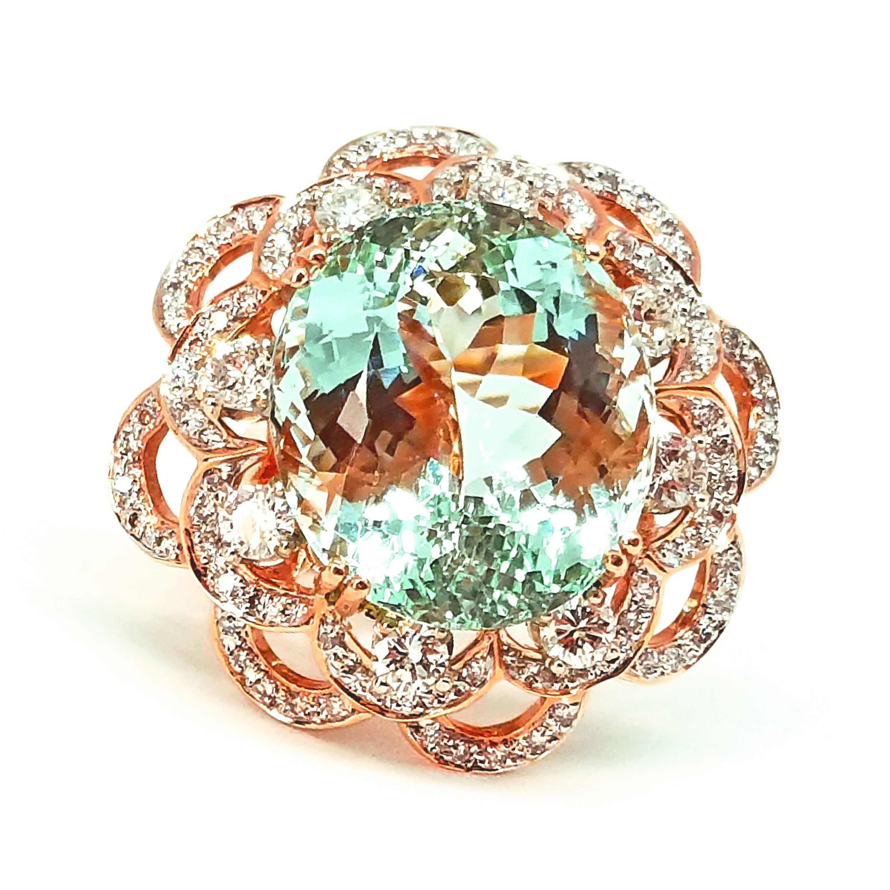 One of a Kind Statement Cocktail Ring featuring a 19.07 Carat Oval Brazilian Aquamarine of Gem Quality is Brilliantly faceted and sits above a Multi-tiered, Diamond setting of Highly Polished, 18K Rose Gold. The Diamonds in the setting are Round
