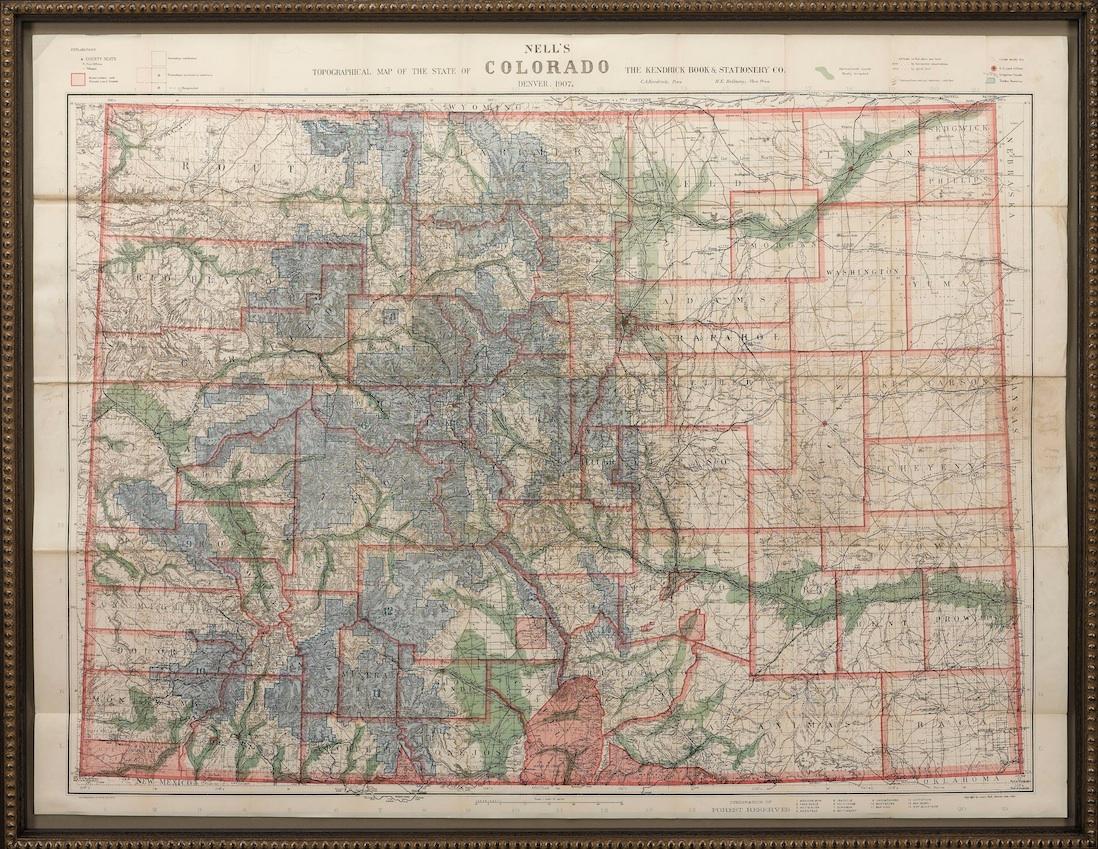 This highly detailed pocket map is a topographical map of the state of Colorado by Louis Nell from 1907. The map 