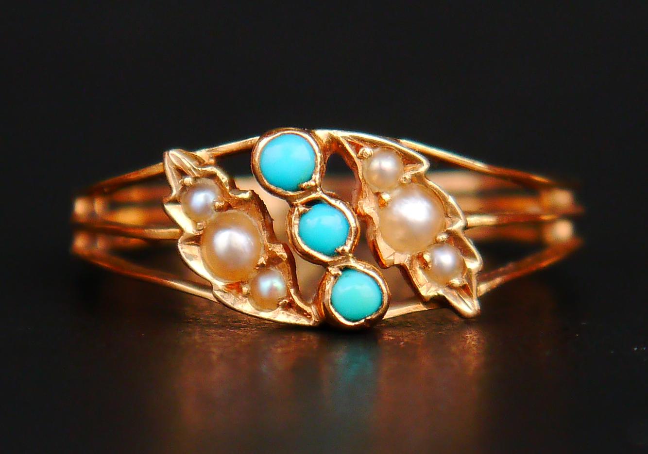Ring in solid 18K Rose Gold with three size-matching natural Blue Turquoise stones flanked with 6 gradually sized Seed Pearls set into leaf-shaped clusters. The backs of the stones are closed.

Swedish ring, all hallmarks except year combination