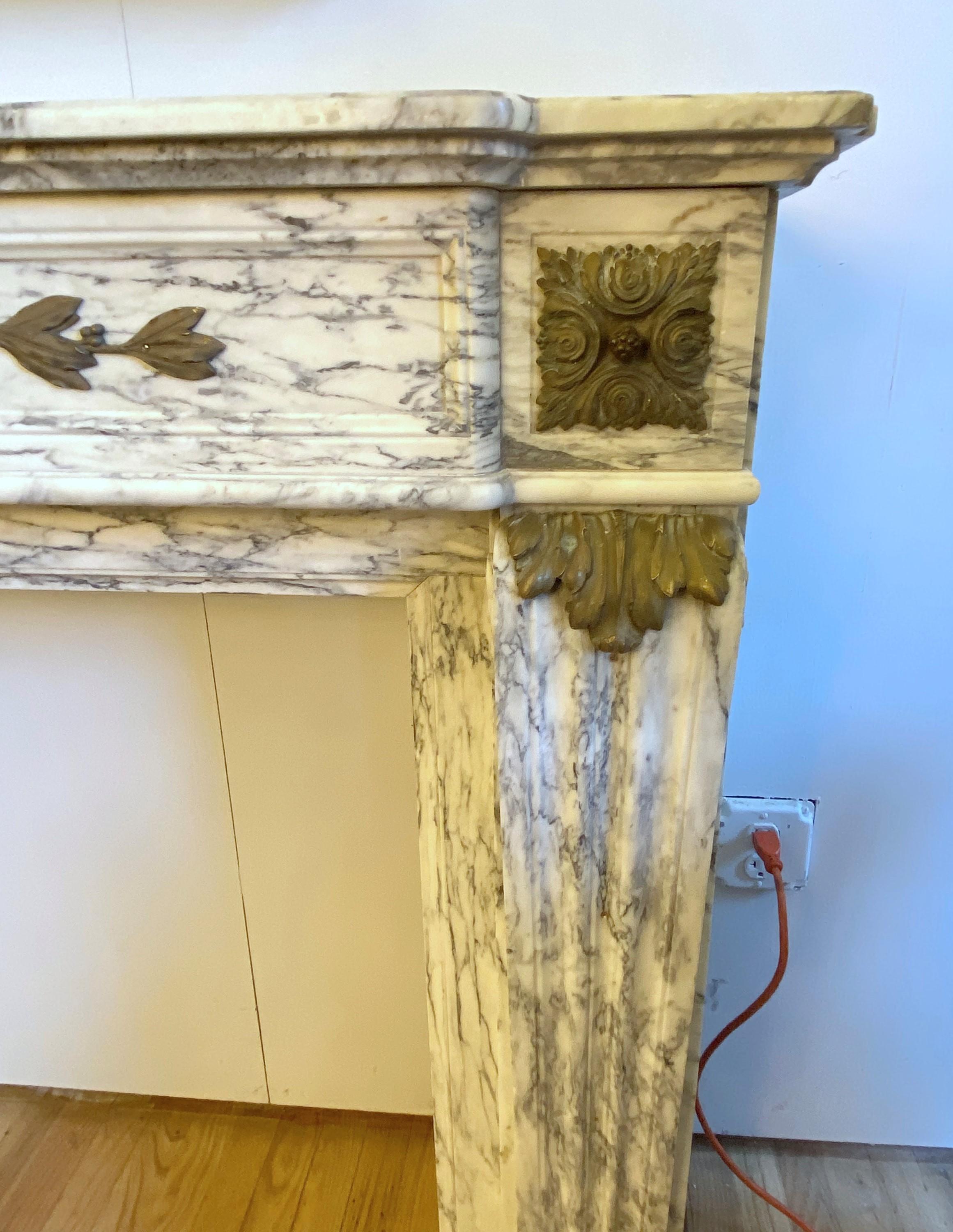 Early 20th Century 1907 NYC Plaza Hotel Carved Marble Mantel Bronze Details For Sale