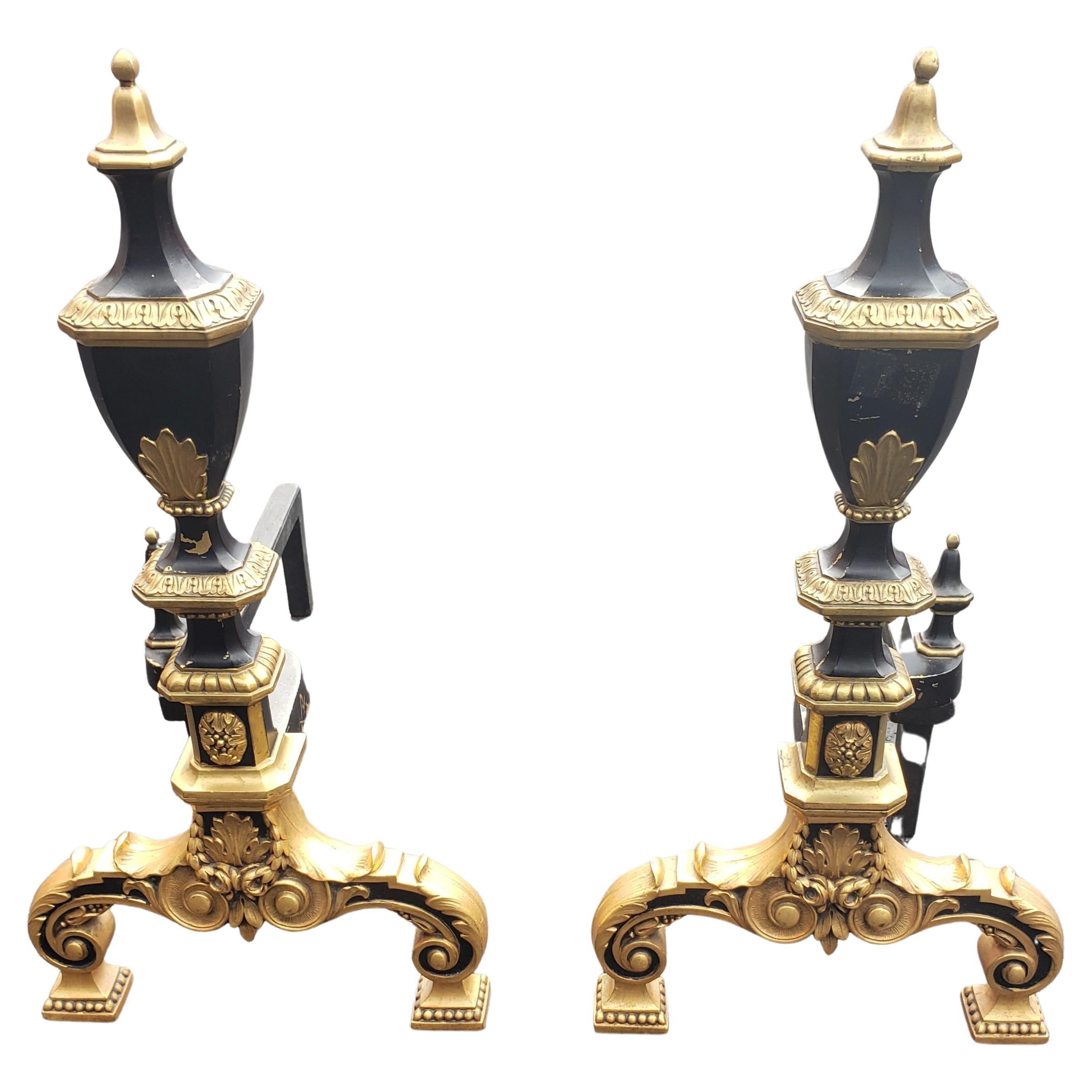 Absolutely gorgeous pair of 1908 Signed WM. H. Jackson Gilt Bronze Ornate Andirons. Trophy like finials and Bronze ornate with paw feet. 
Good antique condition with wear appropriate with age and use. 
Measures 10