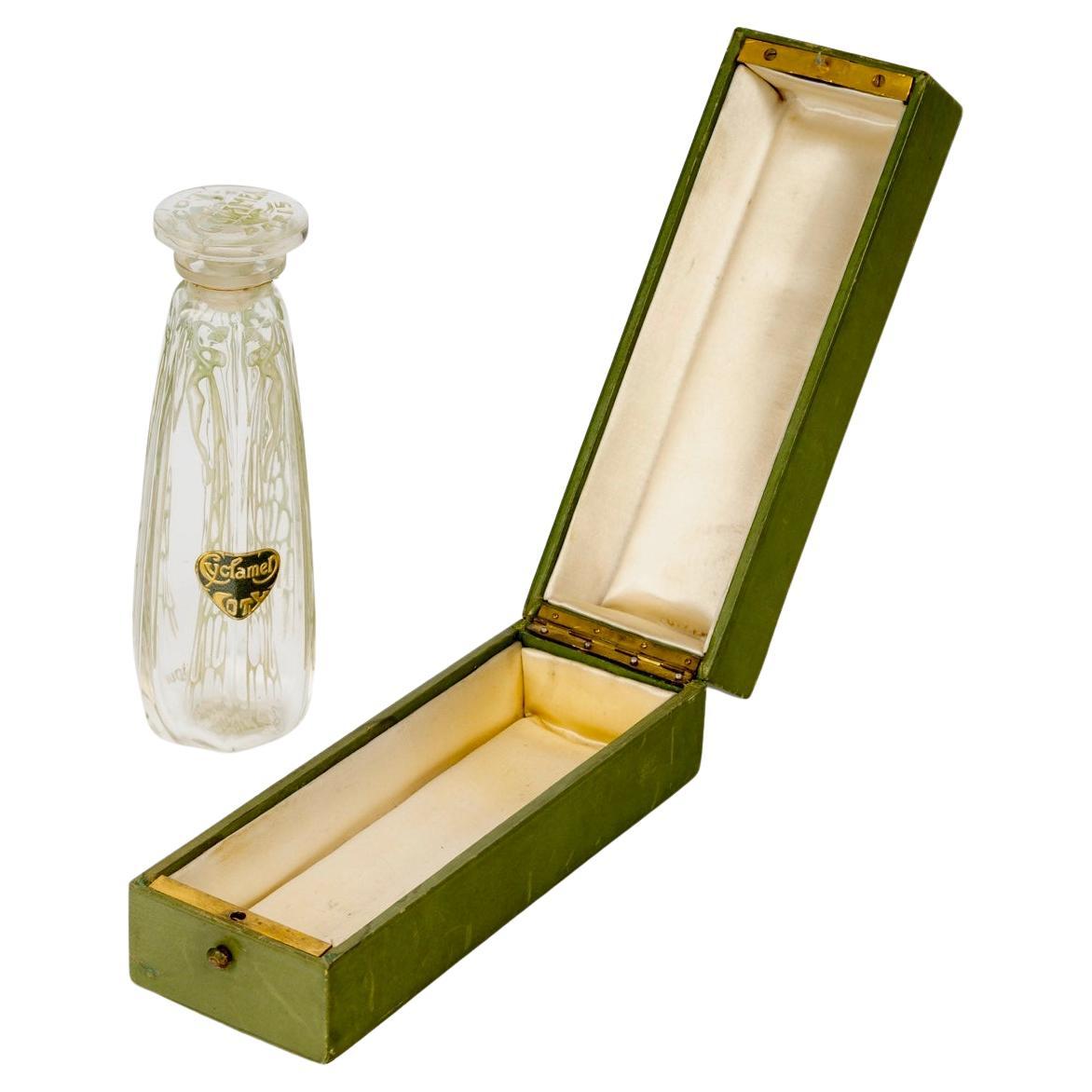 1909 René Lalique Perfume Bottle Cyclamen for Coty Glass Green Patina with Box For Sale
