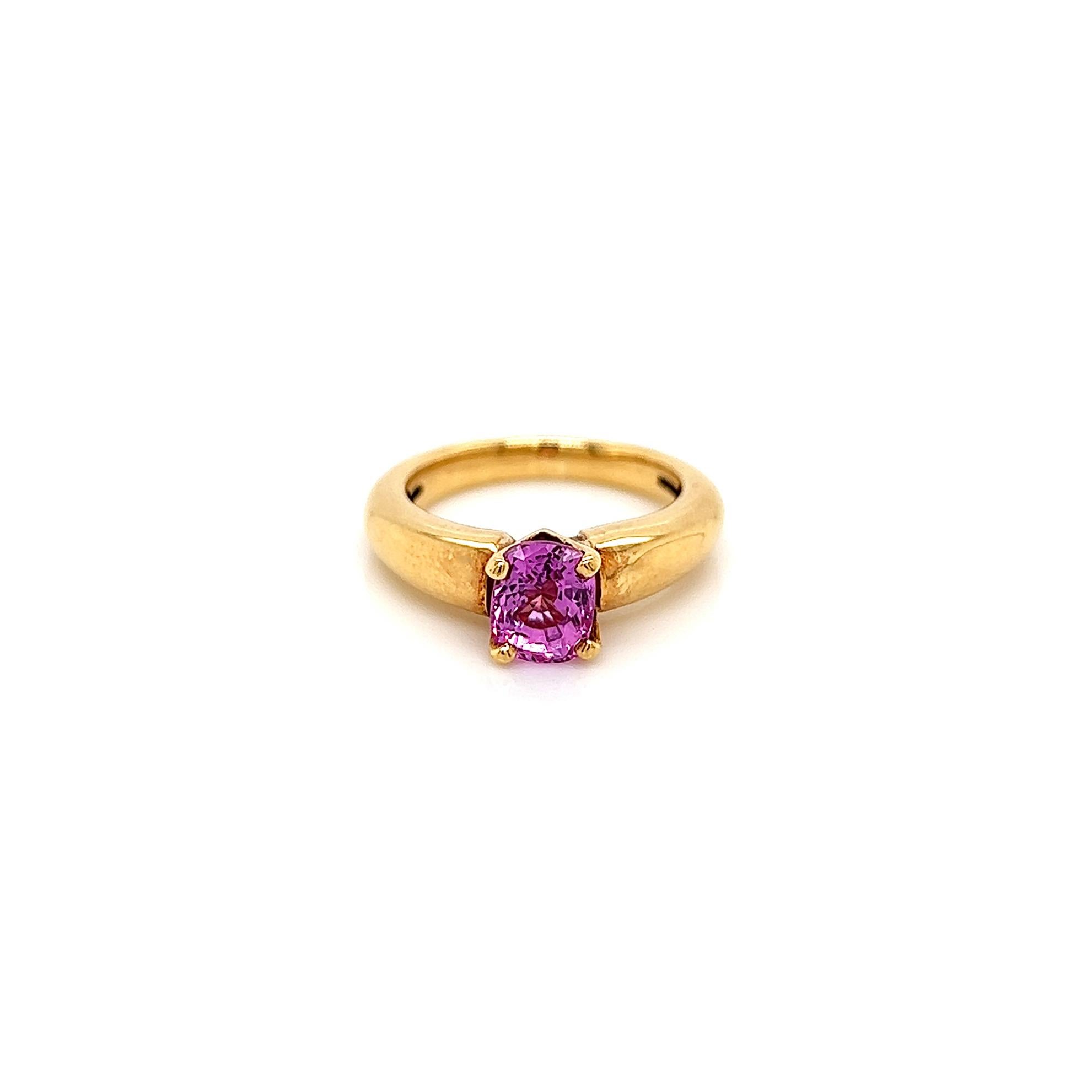 1.90 Carat Pink Sapphire Solitaire Ladies Ring in Yellow Gold Band

-Metal Type: 18K Yellow Gold 
-1.90 Carat Cushion Cut Pink Sapphire 
-Size 5.5

Made in New York City. Band size is adjustable for an additional fee.
