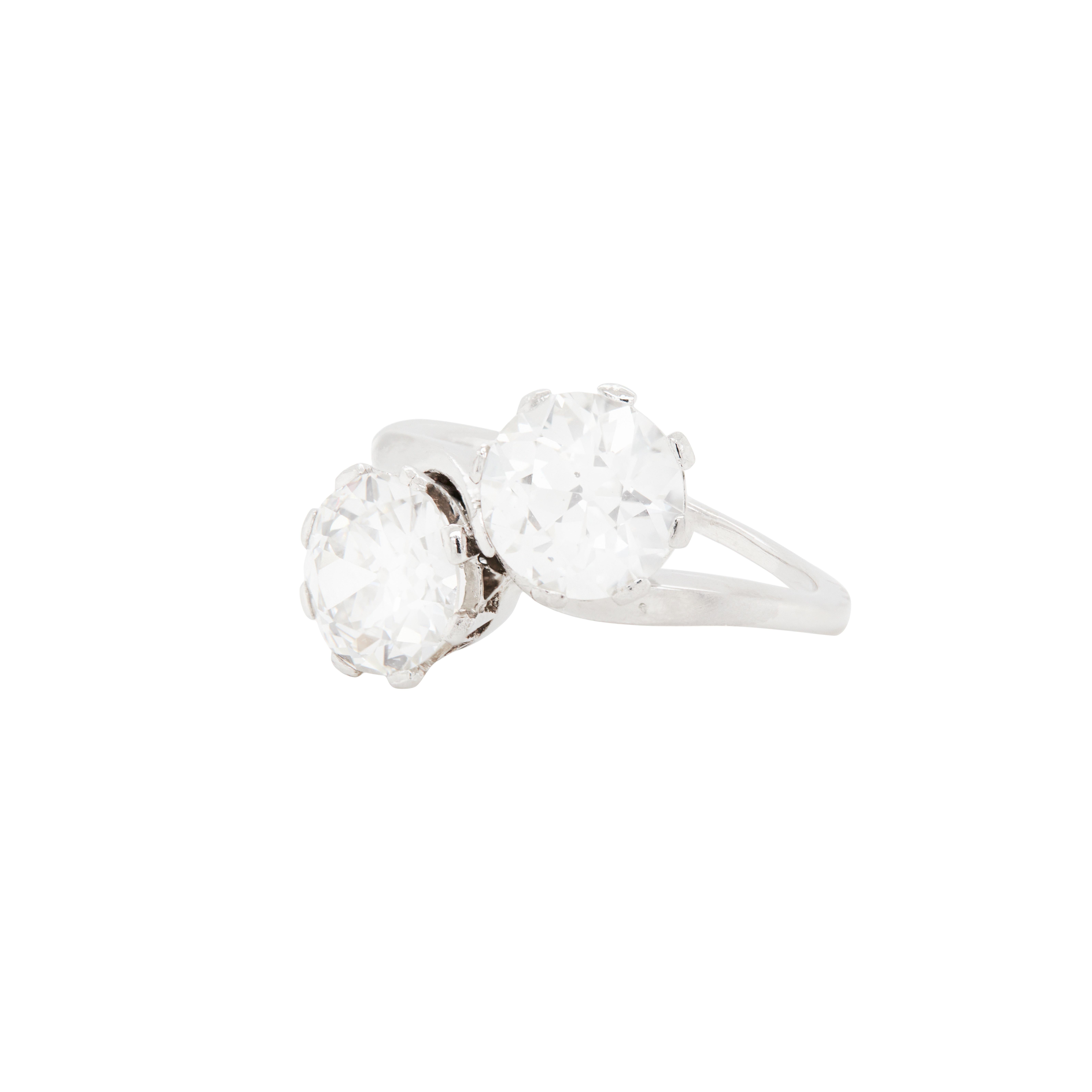 This Toi et Moi engagement ring is absolutely divine! A romantic treasure that celebrates the union of two hearts, it features a delicate crossover design, exquisitely crafted in luxurious platinum.

What makes this ring truly stand out are 2