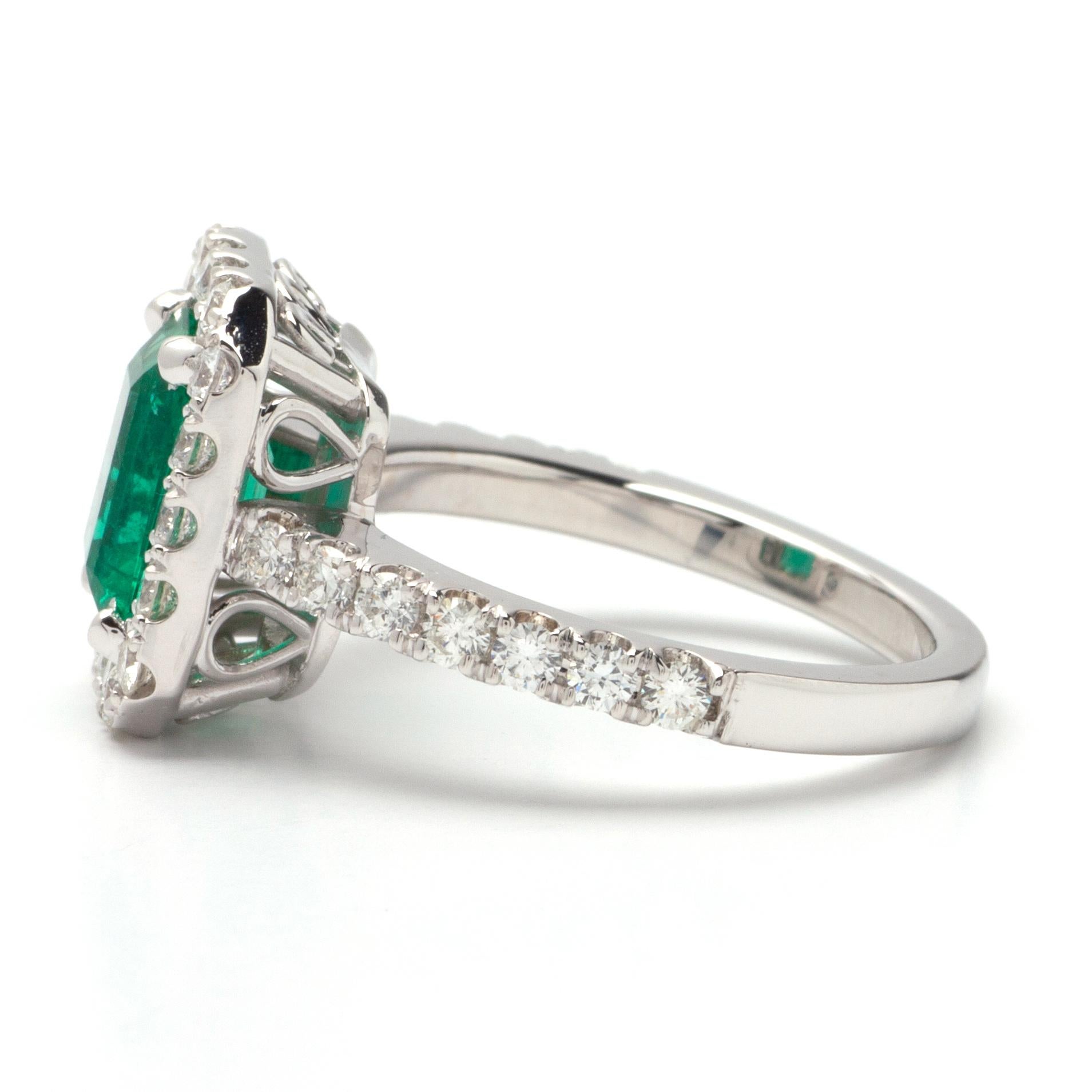 Modern 1.90ct Emerald Halo Ring in 14K White Gold; .90ct Side Diamonds For Sale