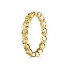 1.90ct Fancy Yellow Oval Cut Diamond Bezel Eternity Band in 18k Yellow Gold