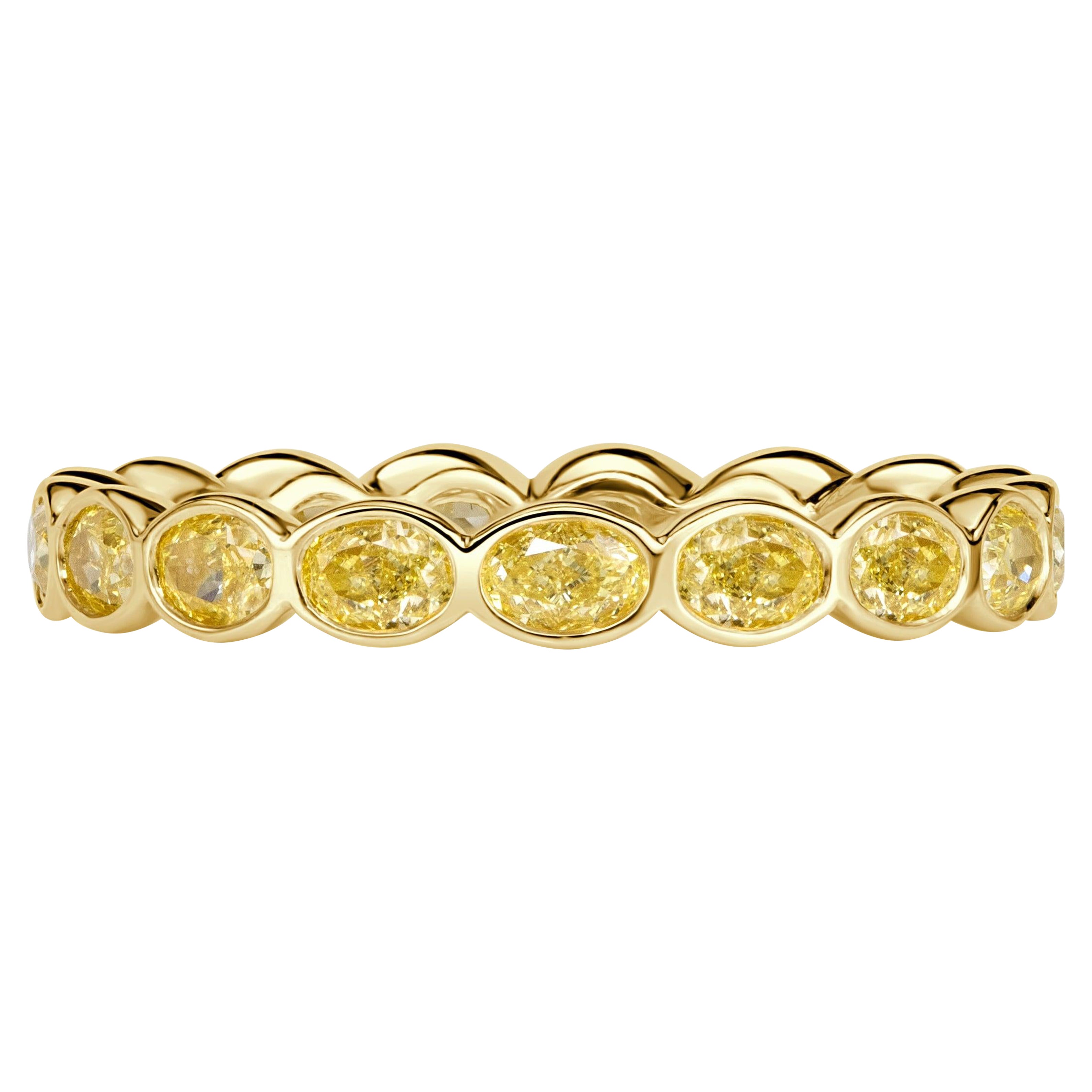 1.90ct Fancy Yellow Oval Cut Diamond Bezel Eternity Band in 18k Yellow Gold