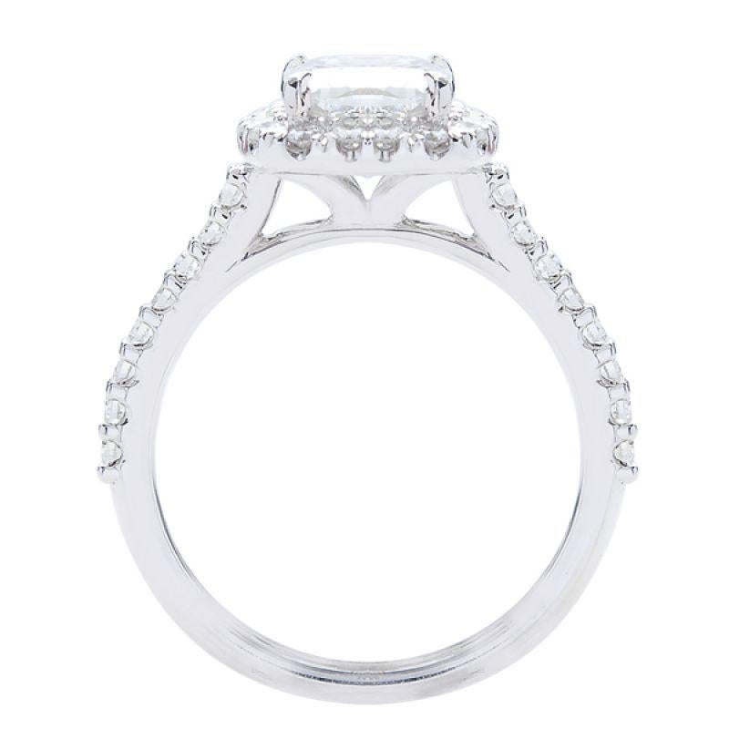 This ring features a halo design of G color, VS1 clarity, and 0.60ct side diamonds set in 14K white gold. The center diamond is a 1.90ct Radiant Cut J color, VS2 Clarity GIA diamond. Center stone measures 7.79 x 6.22 x 4.32 mm. Finger size can be
