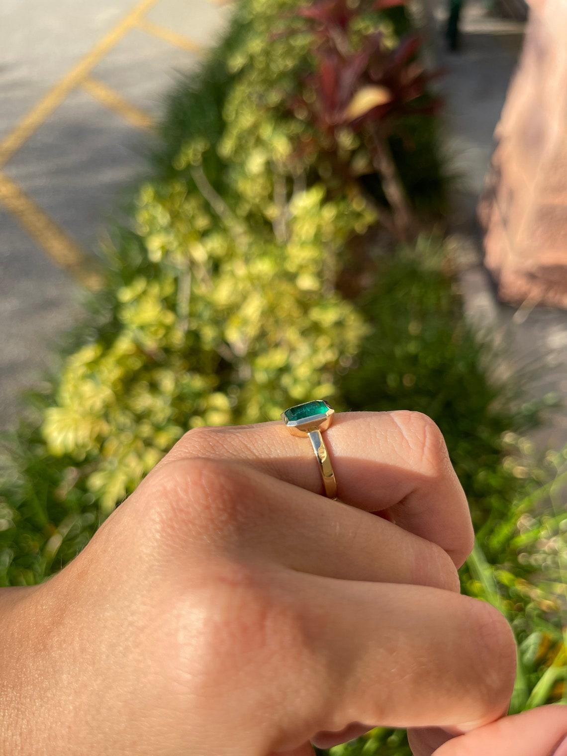 emerald ring bezel set
