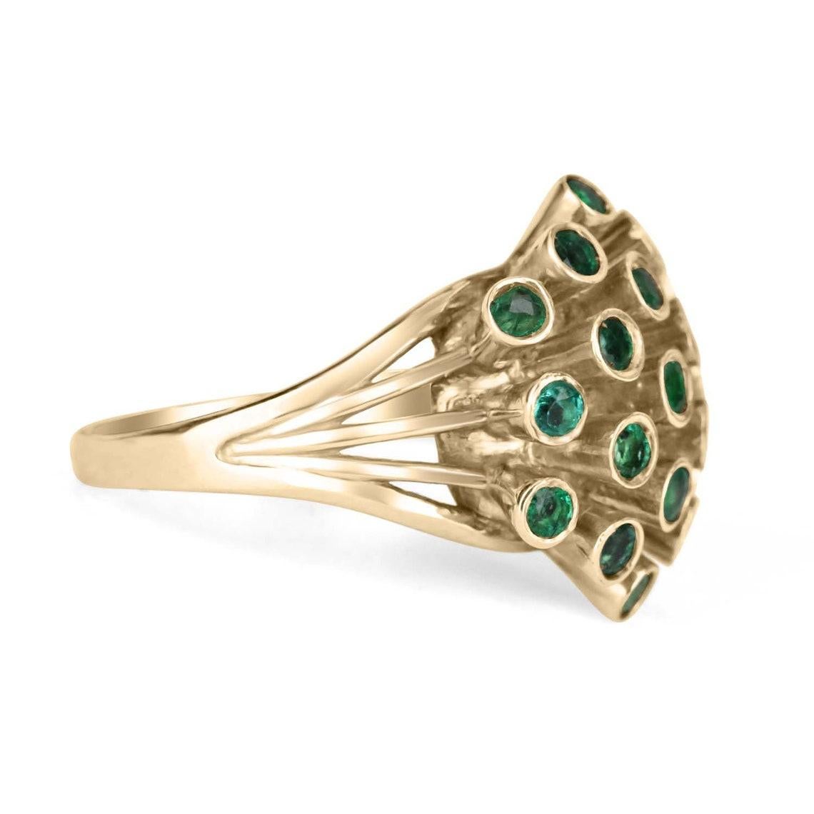 This is our all-new, and one-of-a-kind Colombian Emerald COVID-19 ring. There are 19 beautiful medium-dark green stones totaling approximately 1.90tcw, set in a 14k yellow gold cluster setting. Inspired by one of our lovely customers who was