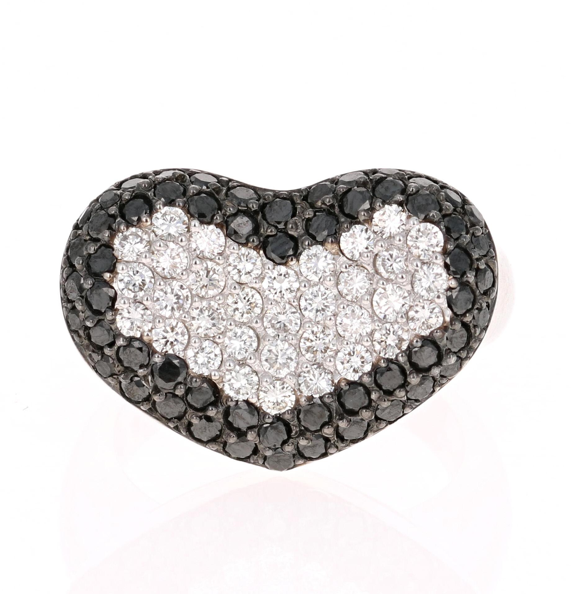 Delicate yet Bold Heart-Shaped Black and White Cocktail Diamond Ring

This gorgeous heart shaped ring has 60 Black Round Cut Diamonds weighing 1.21 Carats and 34 White Round Cut Diamonds weighing 0.70 Carats. The total carat weight of the ring is