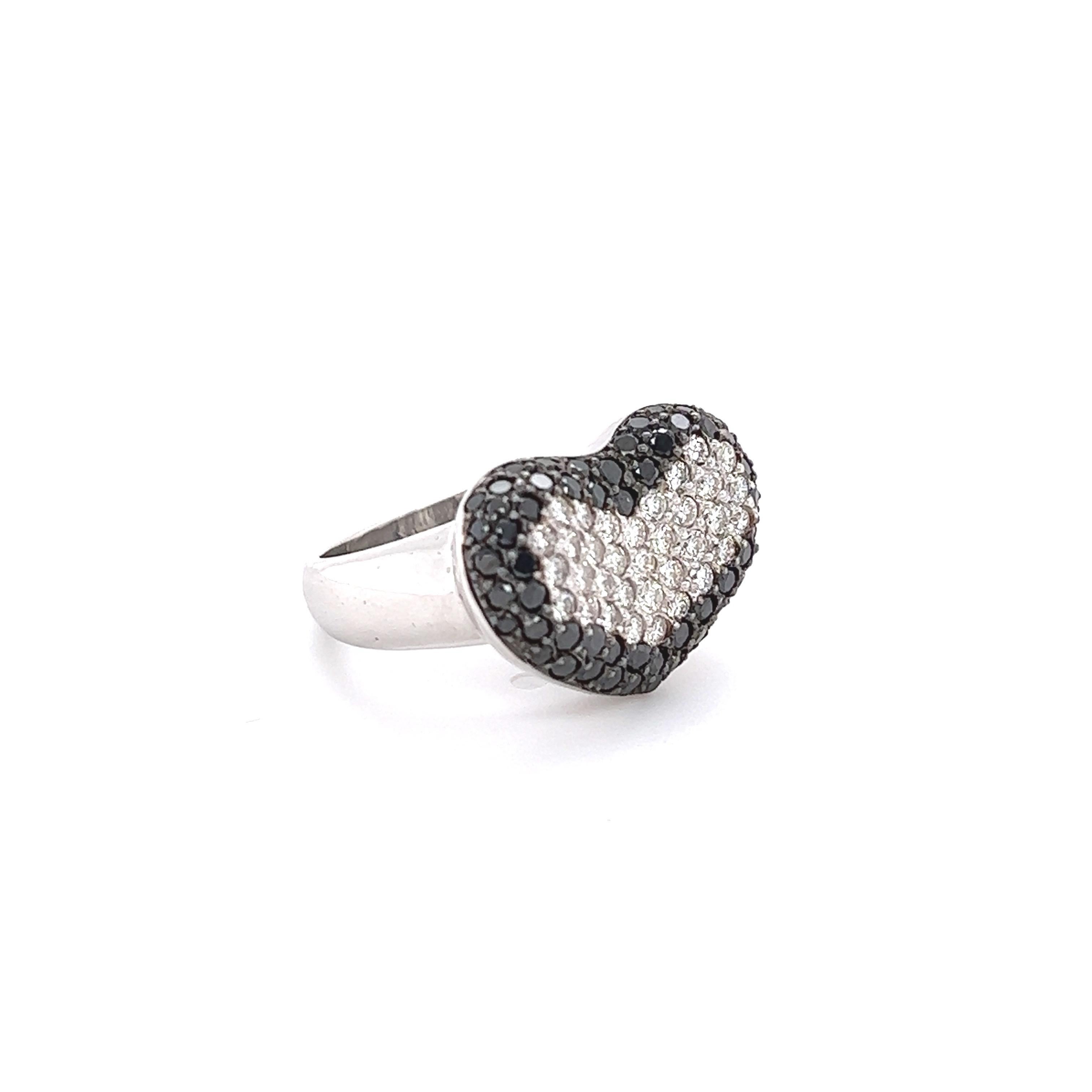 The 60 Round Cut Natural Black Diamonds are 1.21 Carats and also holds 34 Natural Round Cut White Diamonds weighing 0.70 Carats. The total carat weight of the ring is 1.91 Carats. The clarity and color of the diamonds are VS-F

It is beautifully set