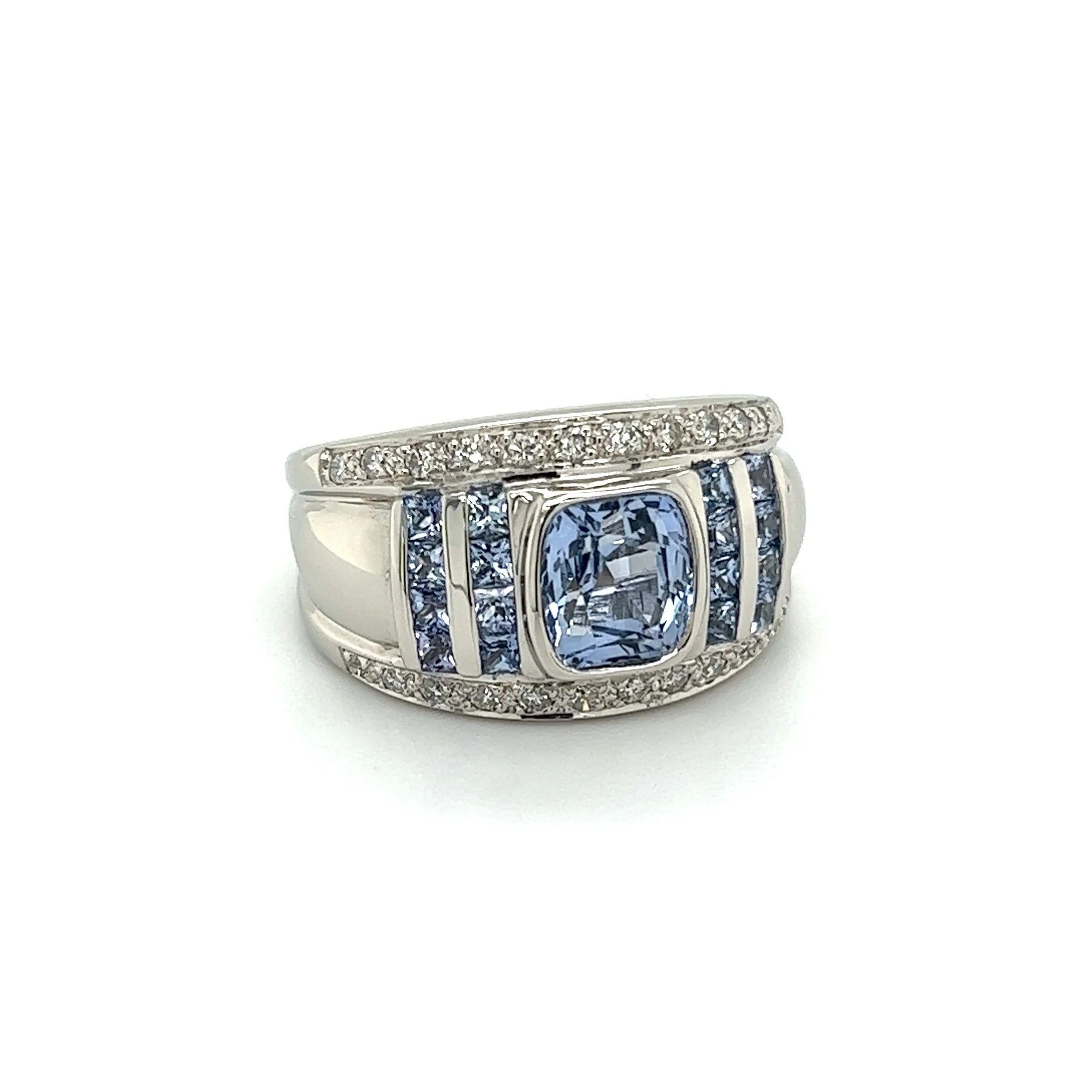 Simply Beautiful! Diamond and Sapphire Platinum 12.5mm Vintage Dome Band Ring. Centering a securely Hand set Cushion Blue Sapphire, weighing approx. 1.91 Carats. Artfully surrounded by 0.73tcw Sapphires and 0.28tcw Diamonds. Hand crafted Platinum