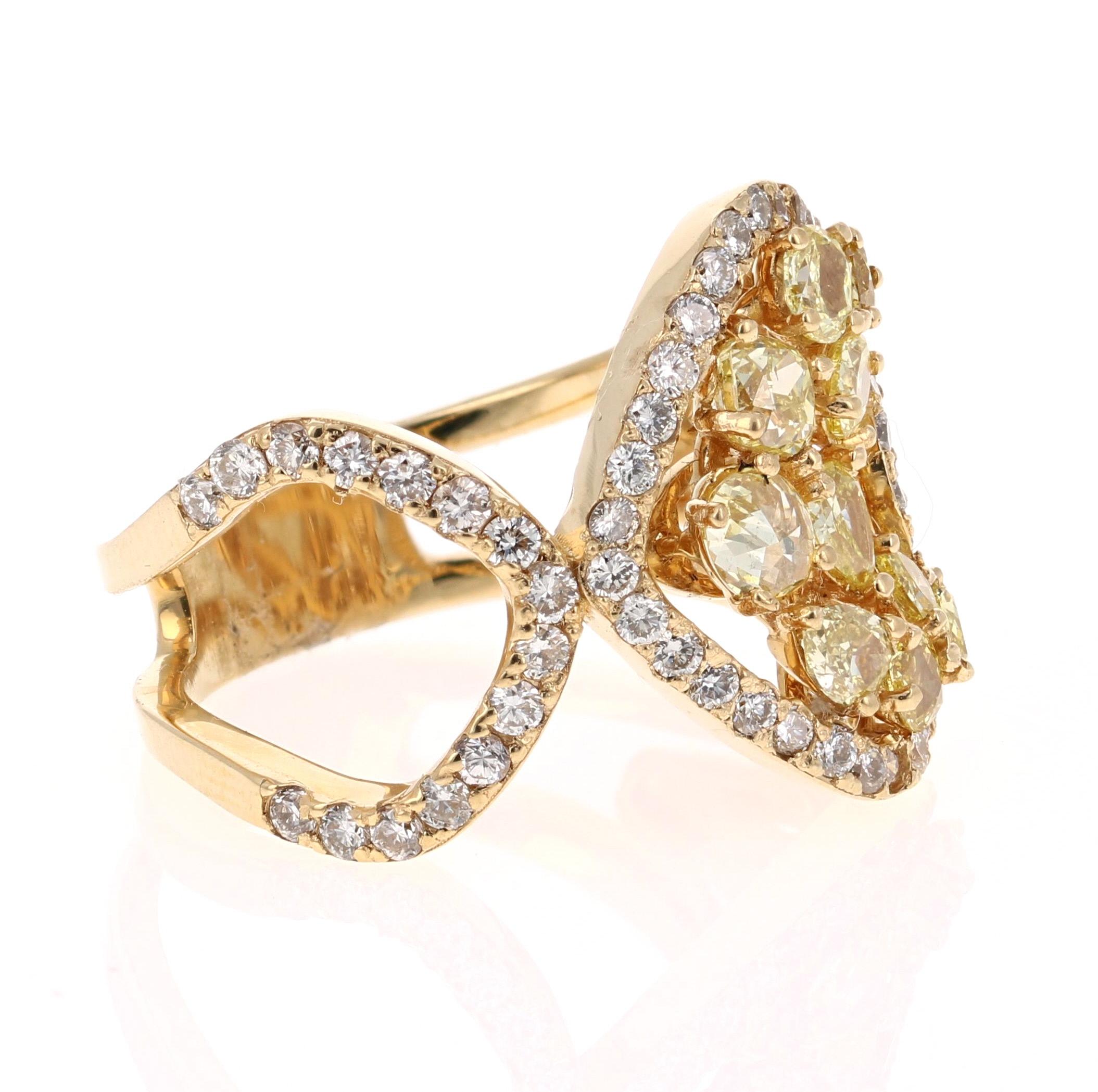 Nothing but a Stunning Beauty! 

This 18 Karat Yellow Gold Ring has 10 Fancy Yellow Diamonds that weigh 1.05 Carats. It is adorned with 62 Round Cut White Diamonds that weigh 0.86 Carats. (Clarity: VS, Color: H) 

The ring weighs approximately 7.5