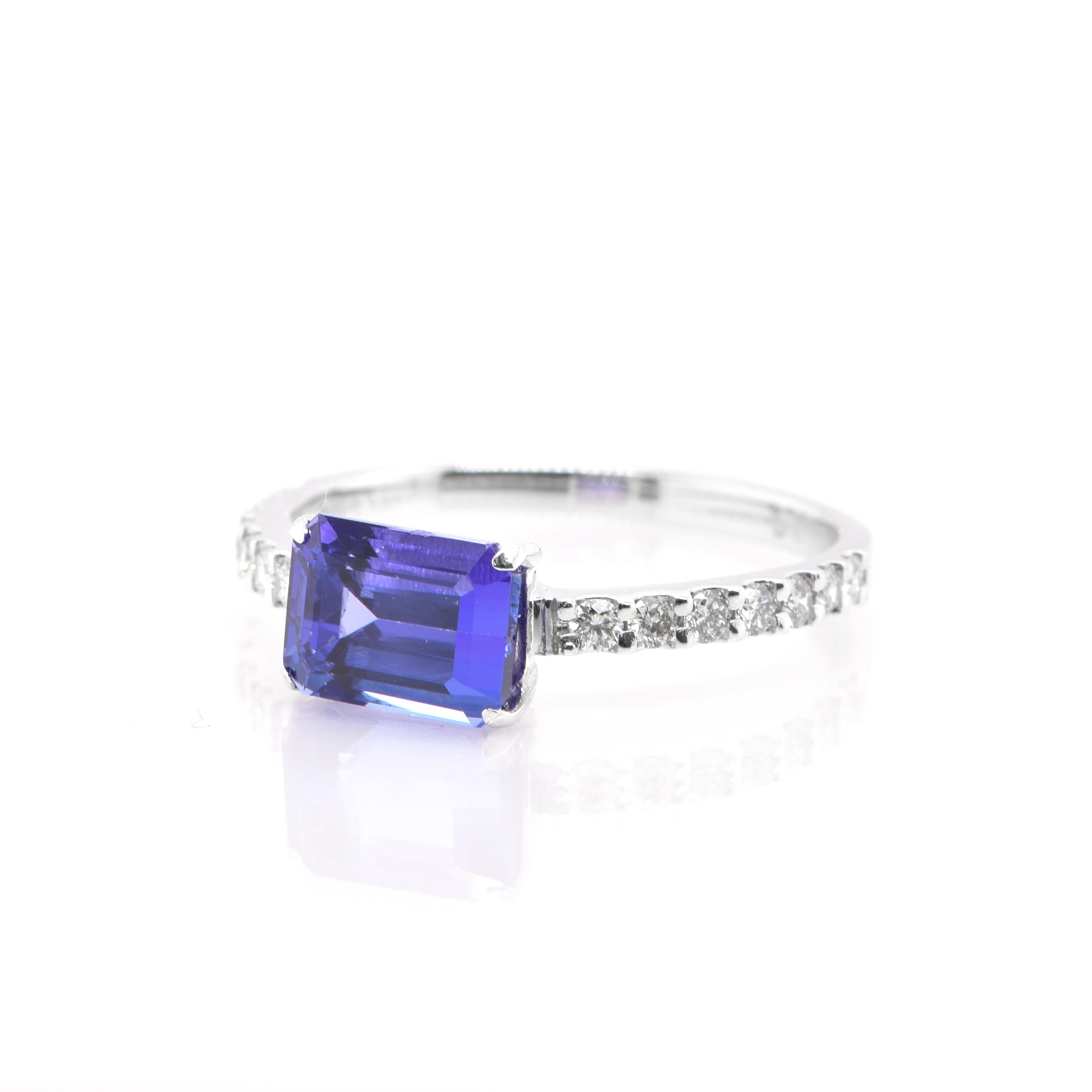 A beautiful Band Ring featuring a 1.91 Carat Natural Tanzanite and 0.25 Carats of Diamond Accents set in Platinum. Tanzanite's name was given by Tiffany and Co after its only known source: Tanzania. Tanzanite displays beautiful pleochroic colors