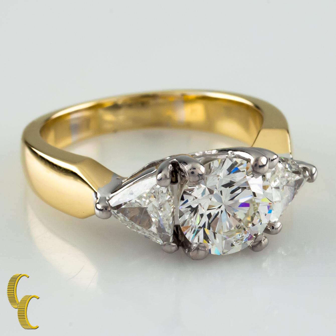18k White & Yellow Gold
Featuring One Round Brilliant Diamond And Two Trillion Cut Diamonds
Total Diamond Weight: Approximately 1.91 Cts (Round Approximately : 1.21 Cts, Two Trillion Approximately: 0.7 Cts)
Average Color: I
Average Clarity: SI1 