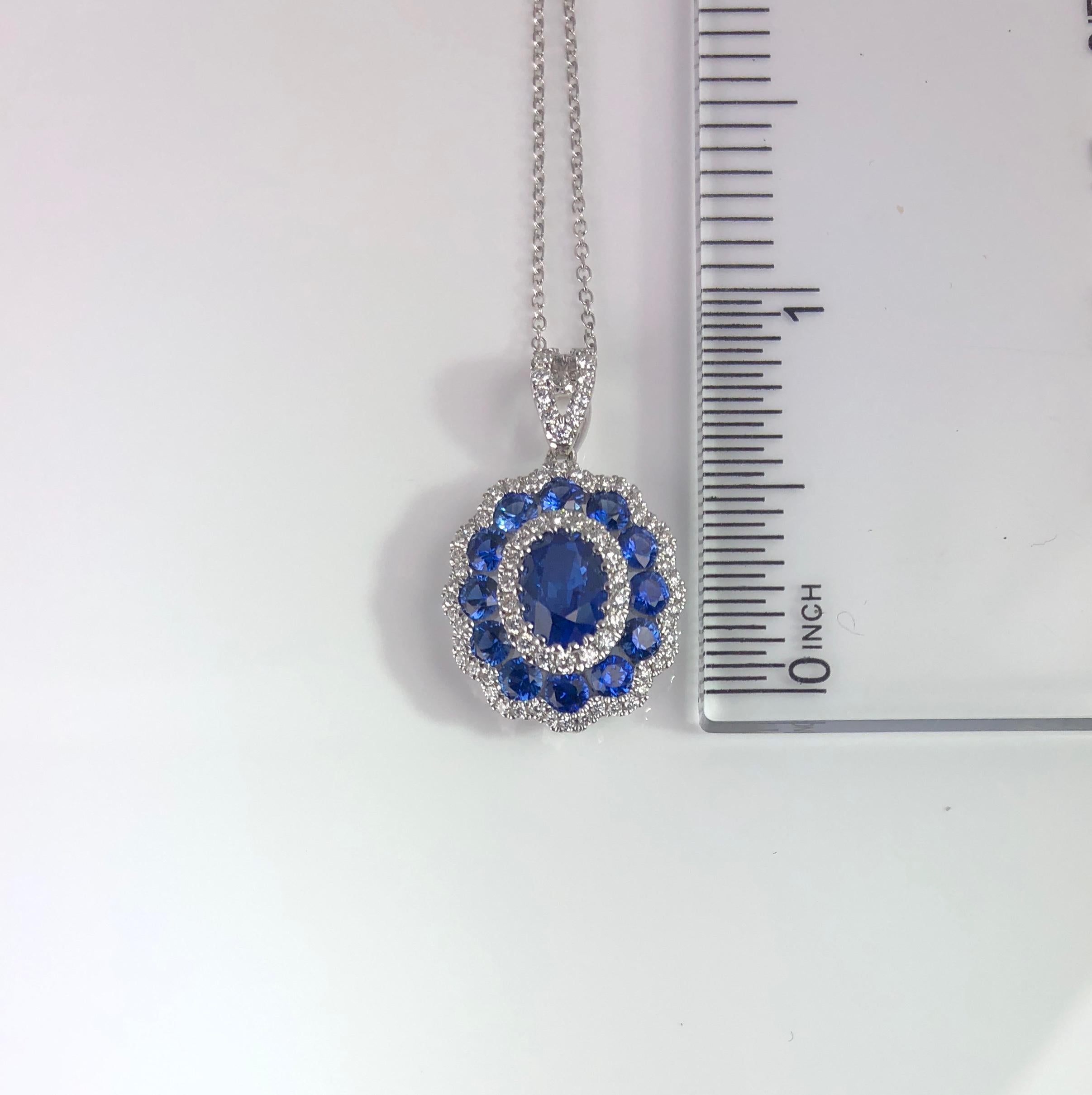 Contemporary 1.91 Carat Sapphire and Diamond Halo Flower Pendant in 18 Karat White Gold