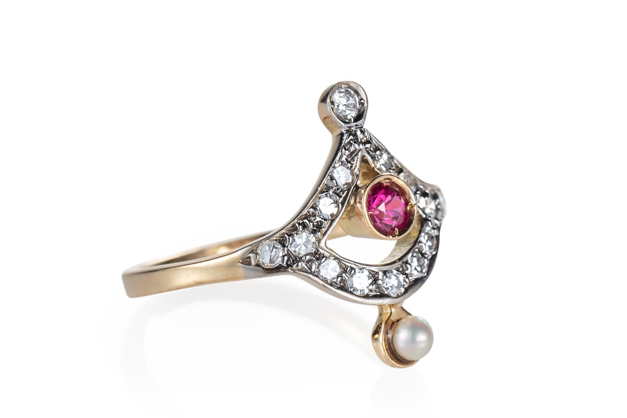 Item Details:
Metal Type: 18 Karat Rose Gold with Platinum Top
Weight: 3 grams 
Ring Size: 4.5 (Resizable)

Diamond Details:
Cut: Single cut
Carat: .15 Carat Total
Color: G-I
Clarity: VS-SI

Features:
A Pearl accent on top and a Ruby-like stone