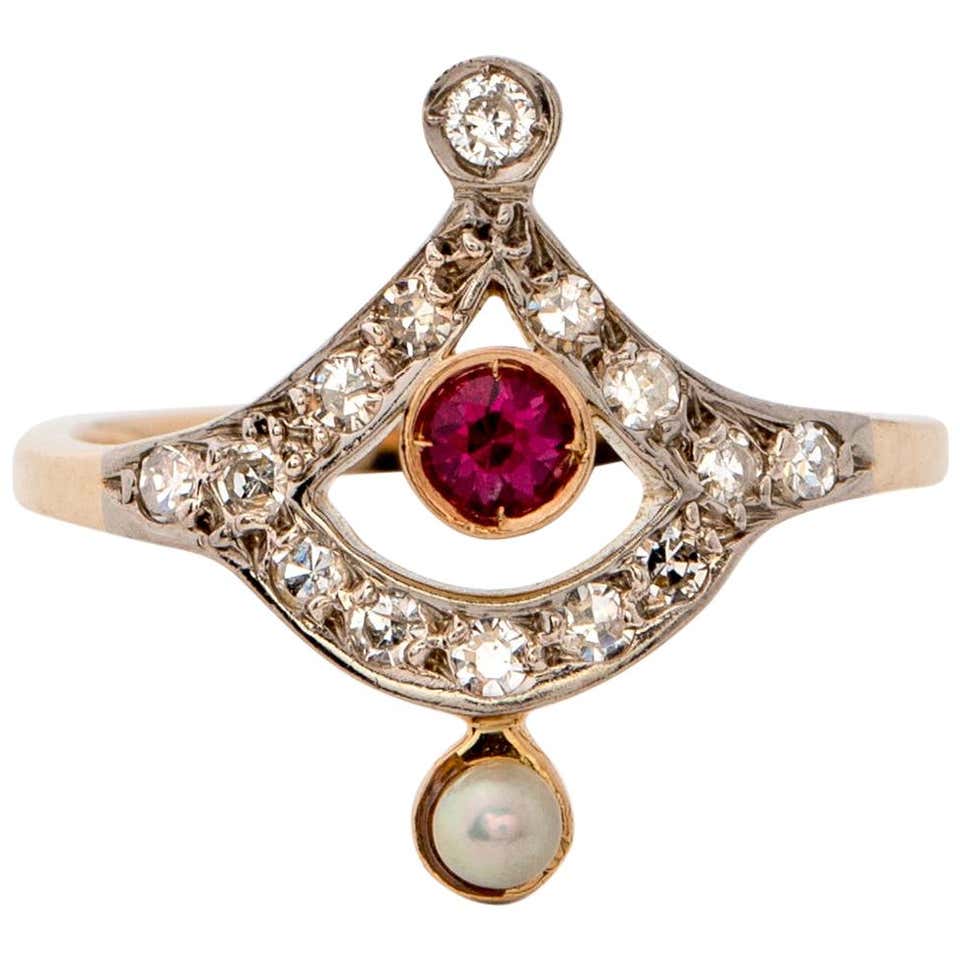 1910s Ruby and Diamond Platinum and 18 Karat Gold Ring at 1stDibs