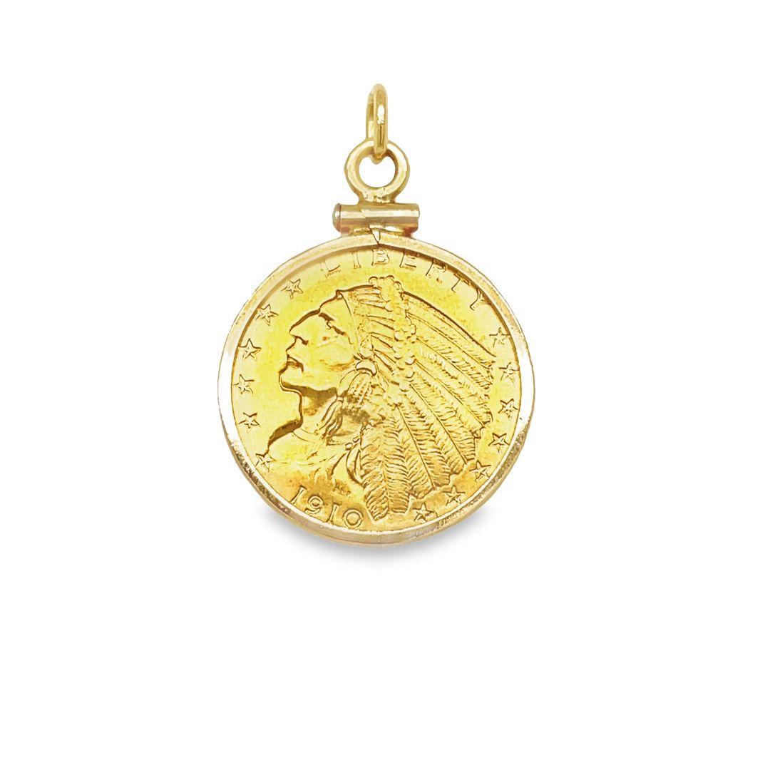 The pendant showcases the 1910 2.50 dollar Indian Head gold coin, containing approximately 22K gold, safeguarded by a frame that envelops both its front and back surfaces. This genuine and rare Indian Head Liberty gold coin is set within a 14k