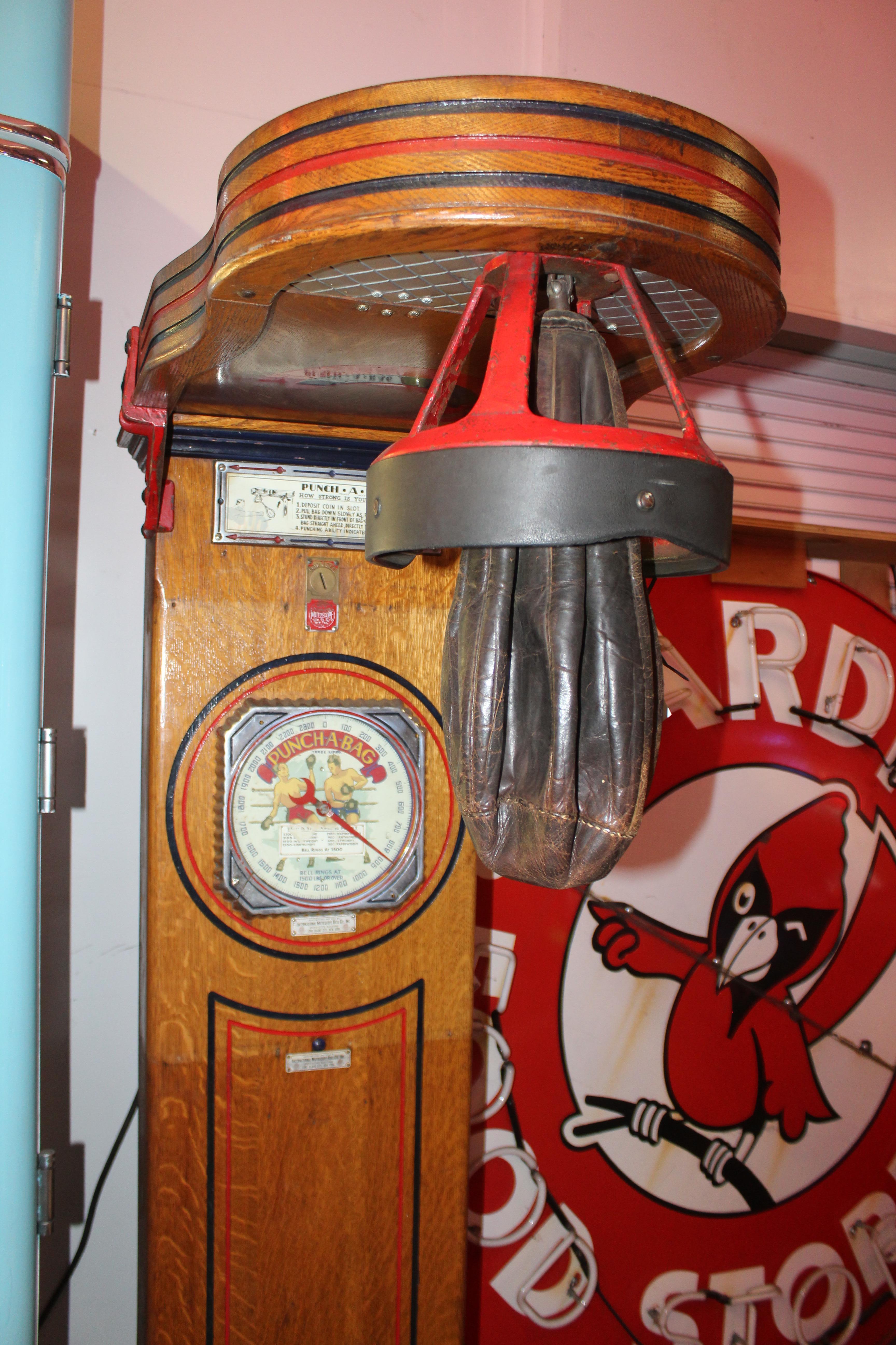 1 cent Mutoscope “Punch-A-Bag” floor punching bag game strength tester arcade machine. This is more of a decoration piece or a great restoration project. It is not a working machine. Machine has some blemishes and wear. Also has a spot that dis